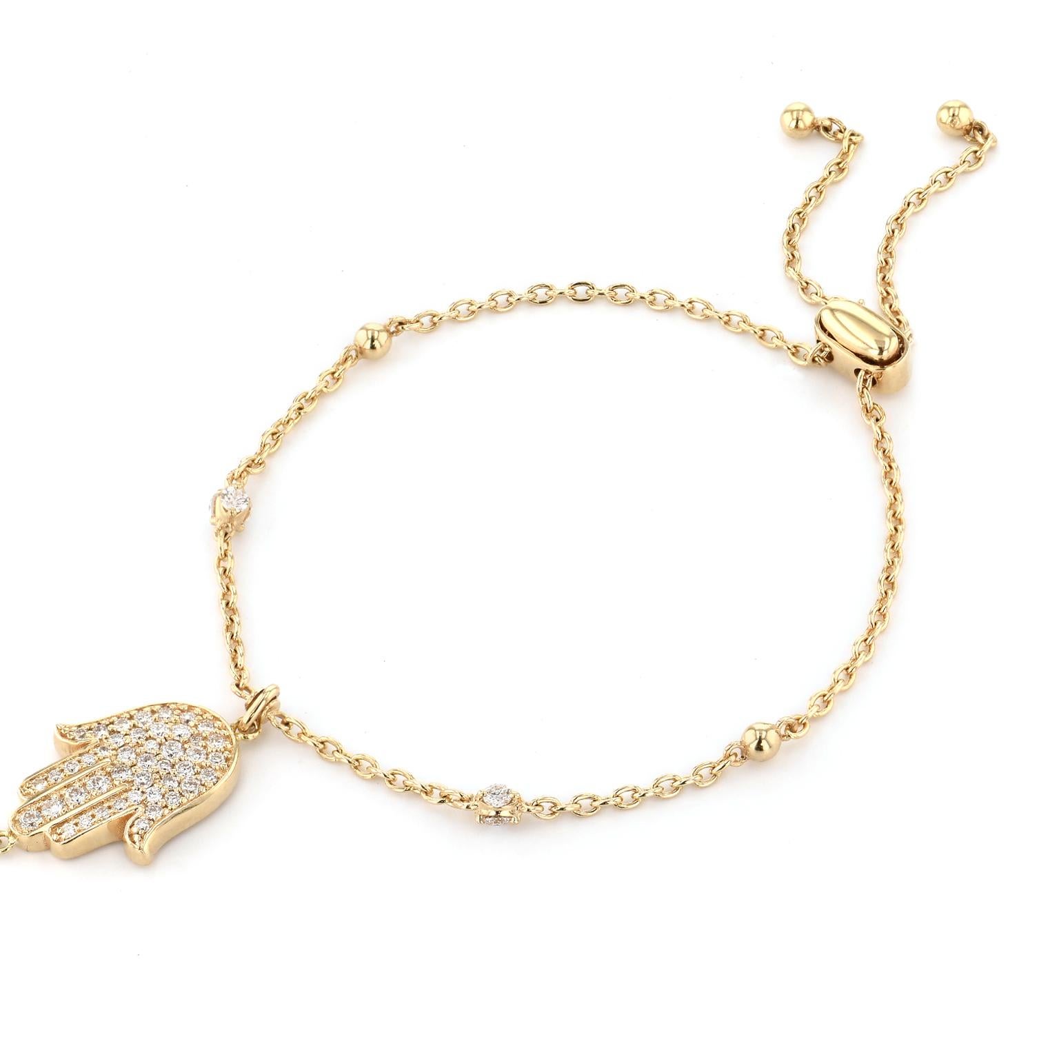 Hamsa Hand 14 karat Yellow Gold and Diamond Chain Bracelet with Ring Attachment

Add luck to your style, with this pave set diamond Hamsa Hand, held in a dainty diamond accented 14 karat yellow gold chain with a slip clasp and a ring chain for an