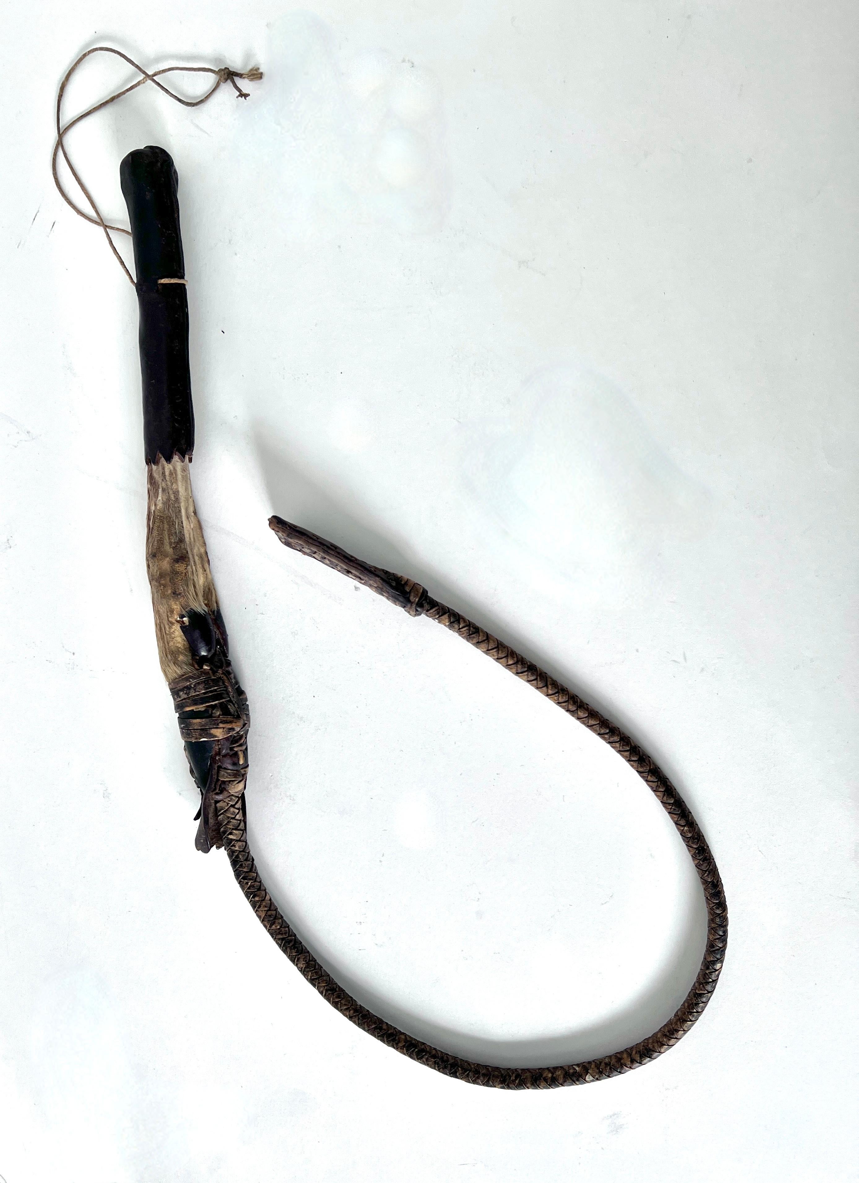 Hand Made / Hand woven leather whip with a hoof handle - the whip Is small and very well presented.  

While the piece is certainly practical, we would see this in a Ralph Lauren Style setting.  A nice addition to any collection or Cabin / western
