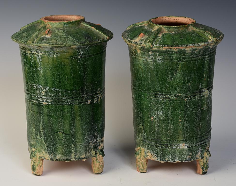 A pair of Chinese green glazed pottery granary jars.

Age: China, Han Dynasty, 206 B.C. - A.D. 220
Size: Height 28.3 - 28.8 C.M. / Width 18.2 - 18.8 C.M.
Condition: Well-preserved old burial condition overall with some amount of soil adhering.

100%