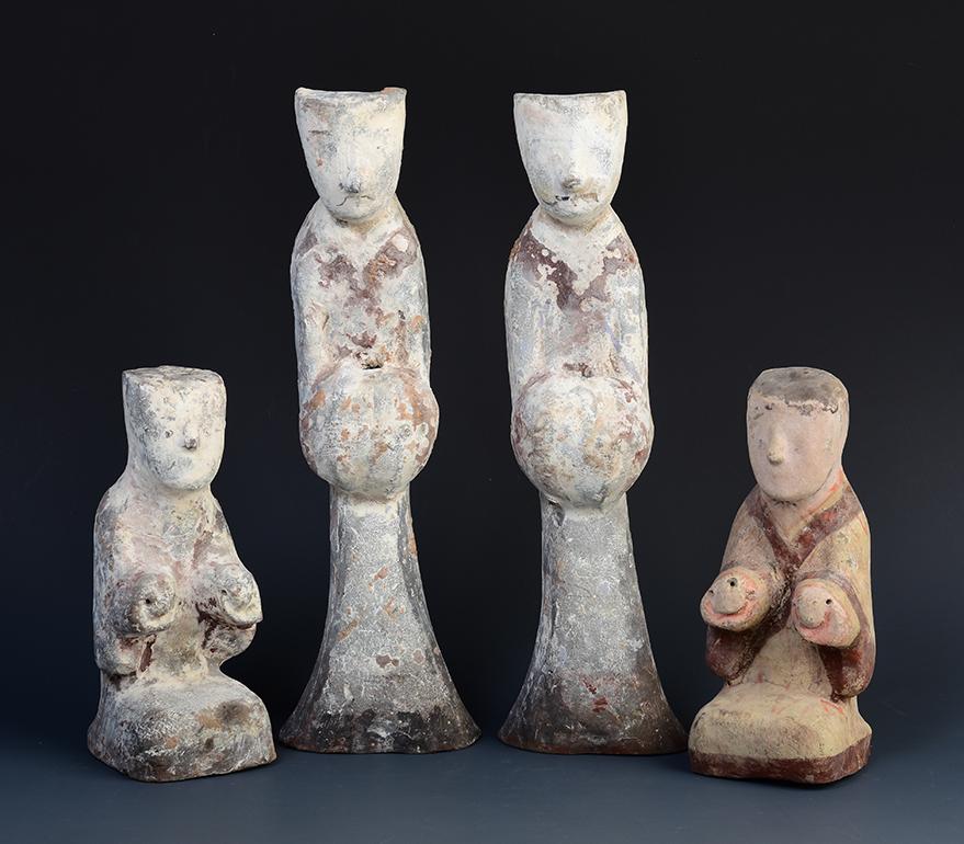 A set of Antique Chinese painted pottery attendants.

Age: China, Han Dynasty, 206 B.C. - A.D. 220
Size: Height 18.4 - 31 C.M. / Width 7.8 - 9.7 C.M.
Condition: Well-preserved old burial condition overall with some amount of soil adhering (some