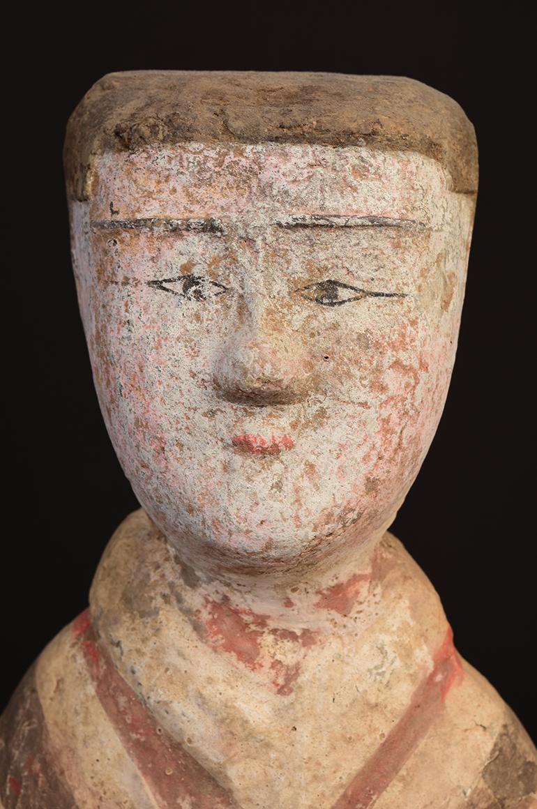 Chinese painted pottery standing court lady.

Age: China, Han Dynasty, 206 B.C. - A.D. 220
Size: Height 50 C.M. / Width 14.8 C.M. (size excluding stand)
Condition: Well-preserved old burial condition overall.

100% satisfaction and authenticity