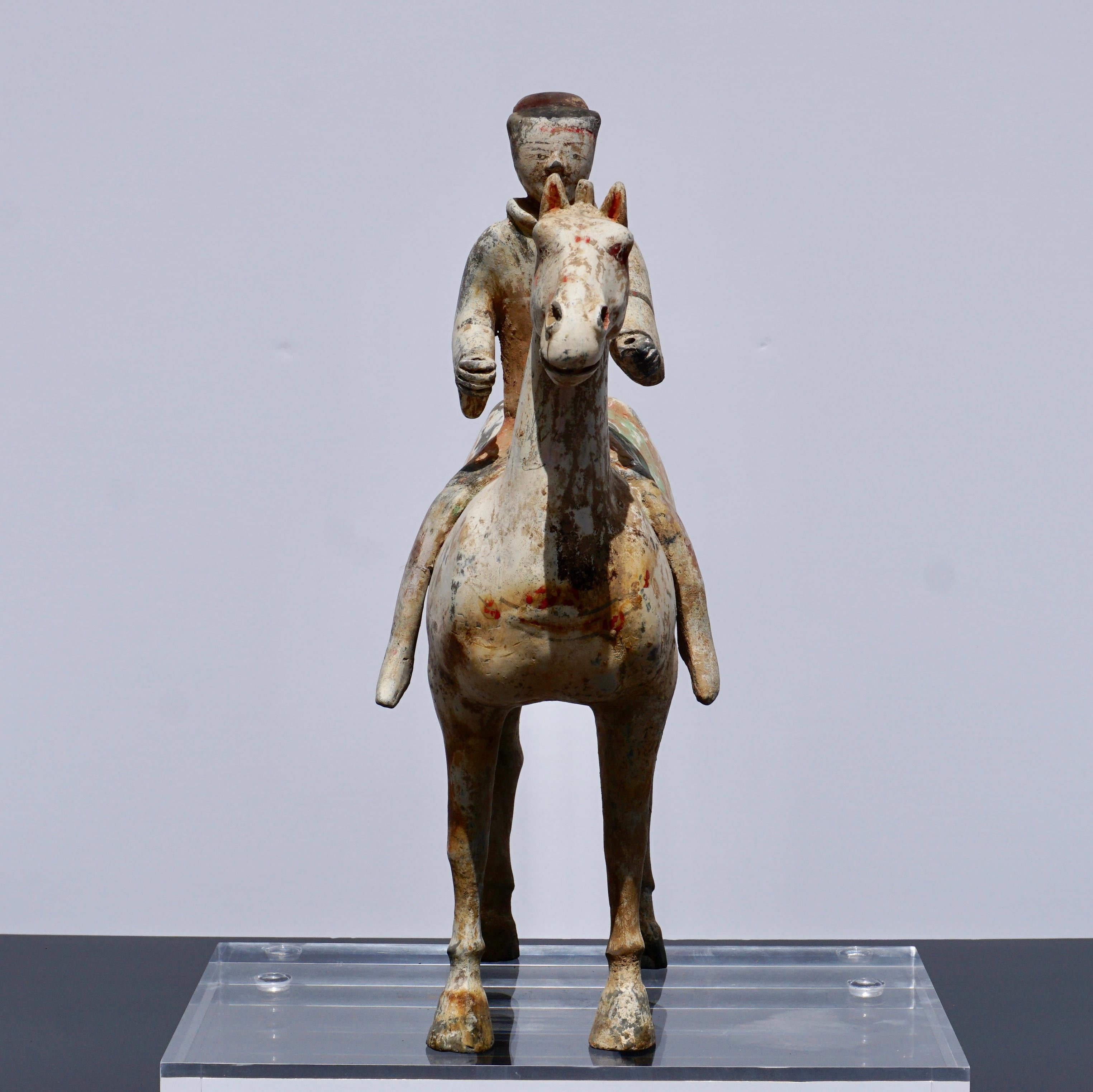 Another fine Han dynasty attributed polychrome painted terracotta horse and rider. The warrior is dressed in orange and green on a white horse. No TL test but 100% guaranteed authentic Han dynasty, A Stand will be included. We accept