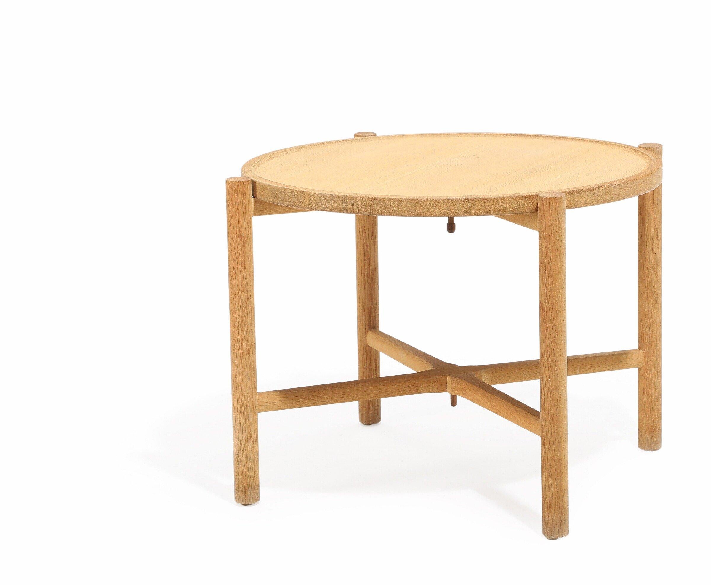 Description: PP35 - A solid oak tray table with circular, reversible top. Designed 1945. Manufactured and marked by PP Møbler.
Designer: Hans J. Wegner
Dimensions: 27.5