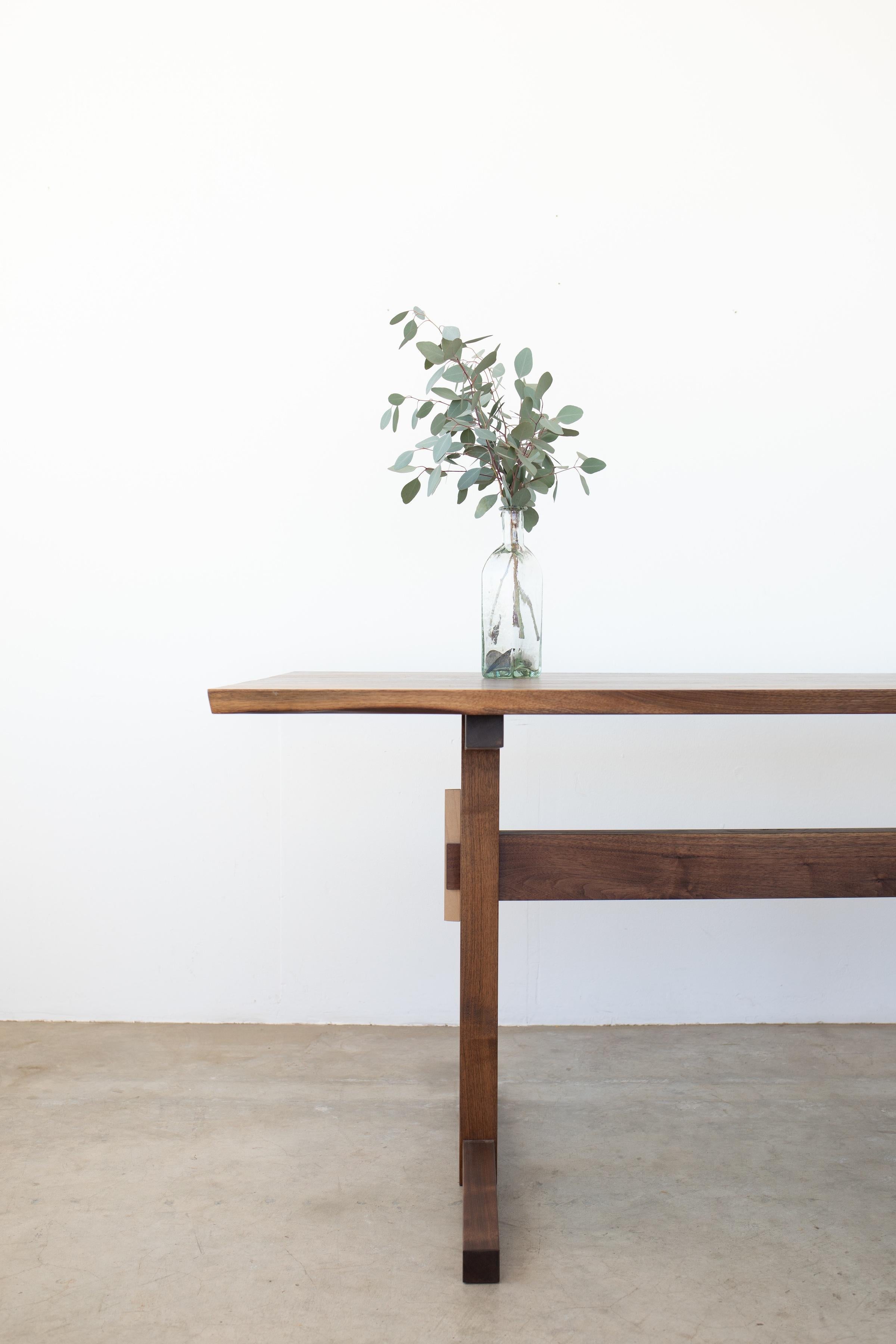 The Hana Trestle dining table is our take on the Classic trestle form, beloved by both the shakers and their distant woodworking cousins, the Japanese-who have reinterpreted the design in the most beautiful ways.

Each table begins with scrupulously