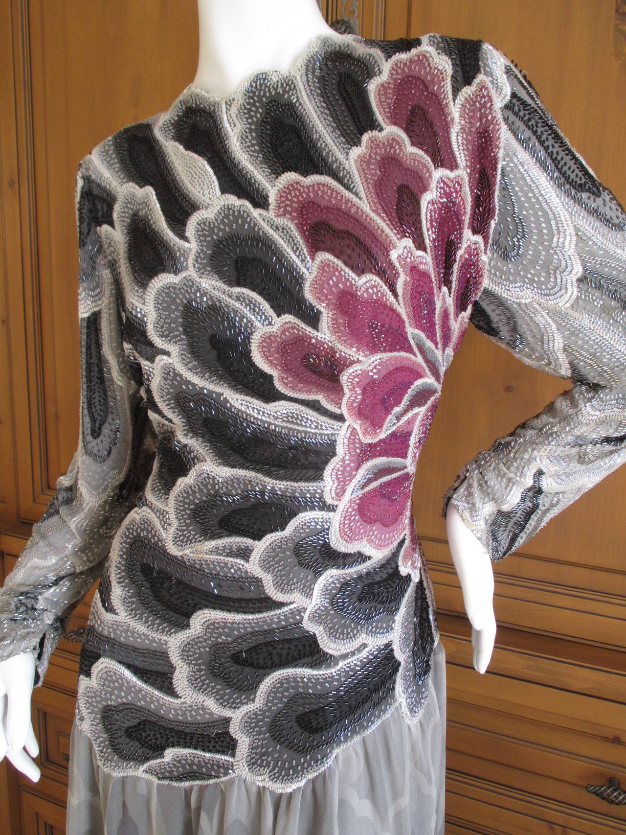 Exquisite beaded chrysanthemum gown from the Couture collection of Hane Mori.
Mori opened her house in 1951 and is the first Asian woman to be admitted as an official haute couture design house by the The Chambre Syndicale de la Haute Couture in