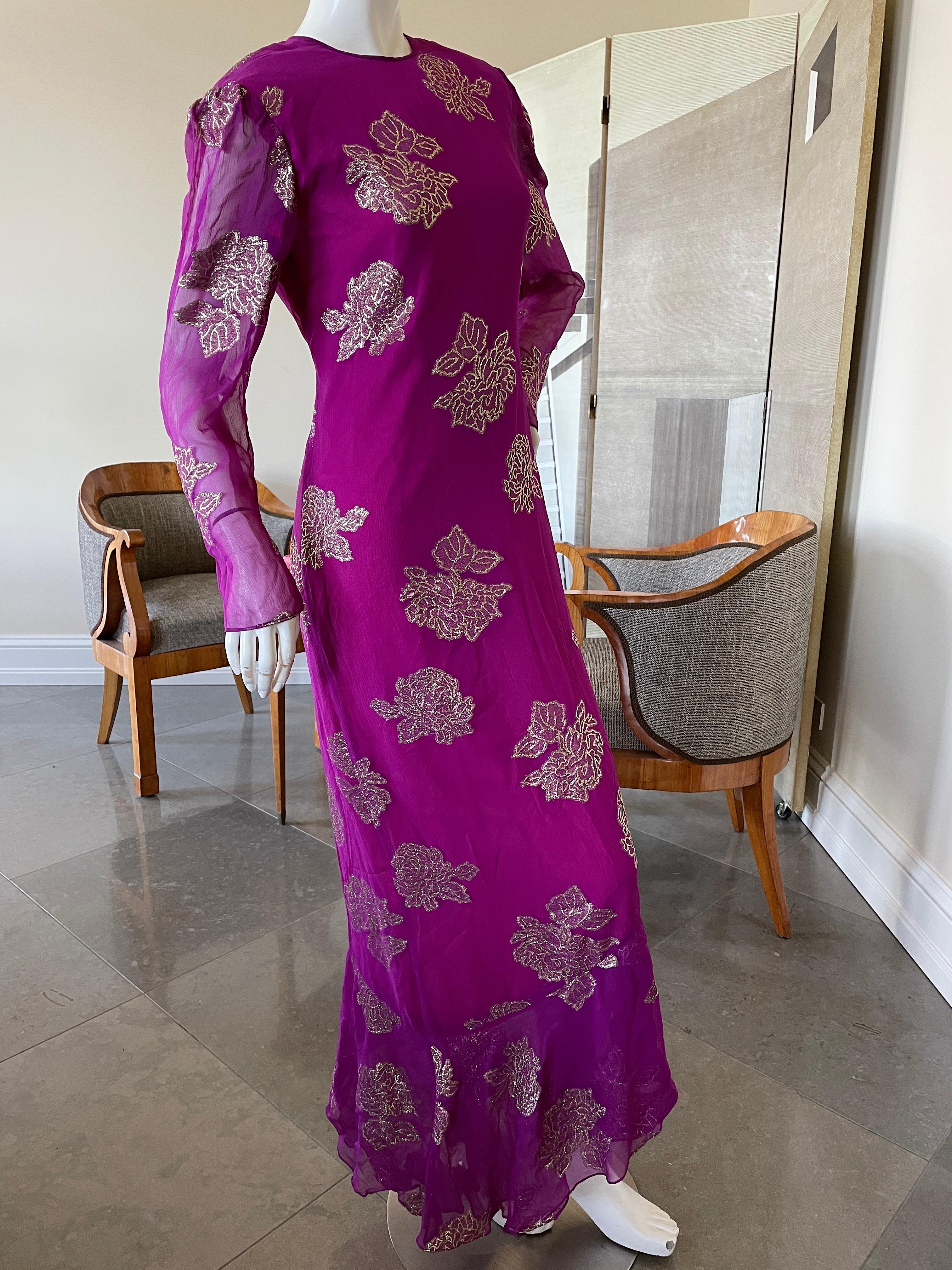 Hanae Mori Deep Pink Silk Chiffon Gold Chrysanthemum Pattern Dress.
Hanae Mori opened her house in 1951 and is the first Asian woman to be admitted as an official haute couture design house by the The Chambre Syndicale de la Haute Couture in Paris