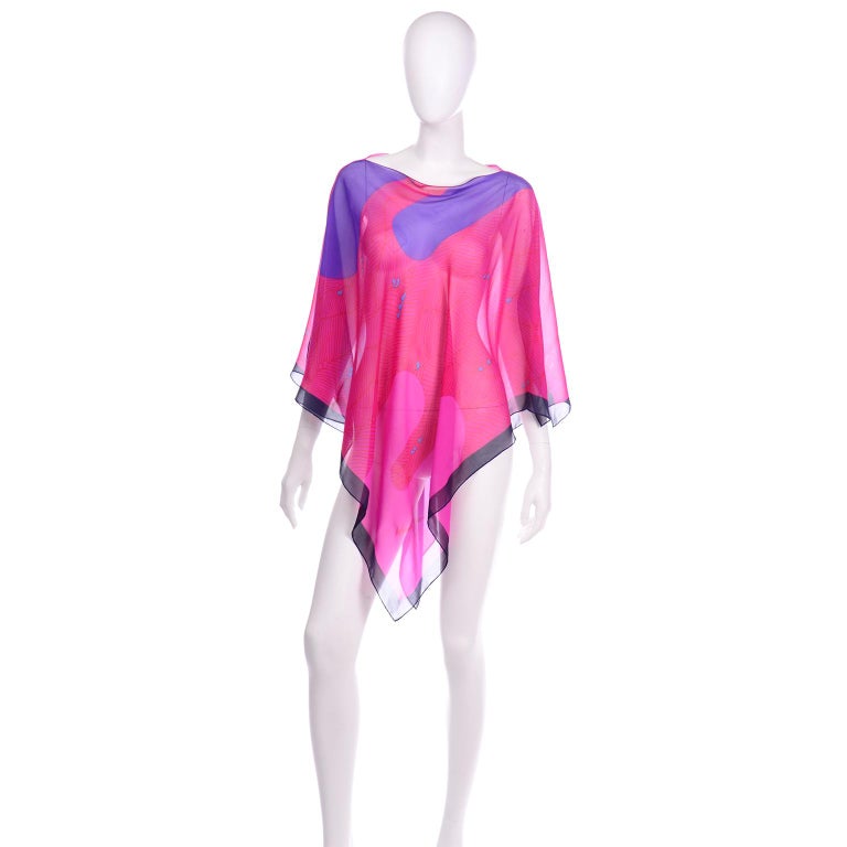 This beautiful vintage Hanae Mori poncho style silk top can be worn over a camisole or bodysuit or even as an elegant swimsuit cover up! We love vintage Hanae Mori pieces and we were so happy to come across this beautiful top! This amazing abstract
