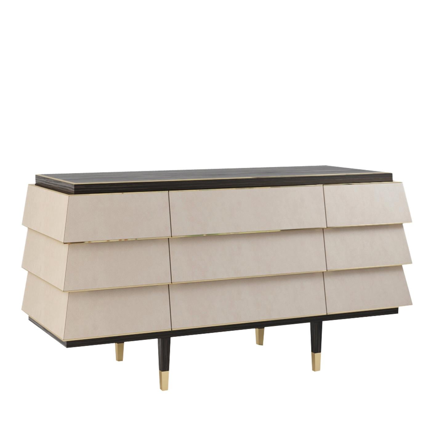 Distinguished by a stunning geometrical design and sharp lines, this exquisite dresser will be a statement piece in a refined contemporary interior. It consists of nine white-lacquered, wide drawers and a rectangular dark brown wooden top, graced by