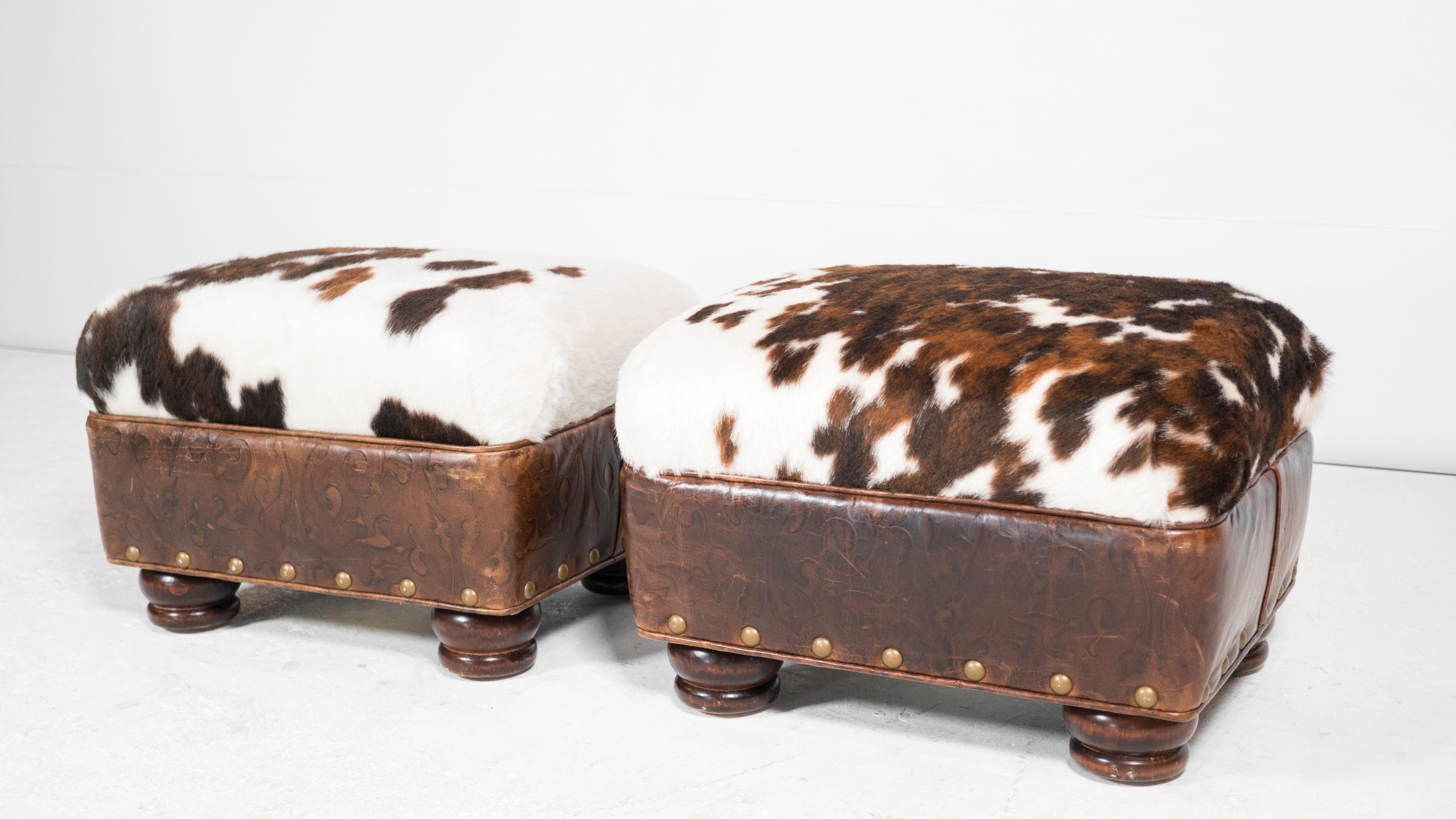 Hancock & Moore Cowhide Ottomans With Nailhead Trim - a Pair In Good Condition For Sale In Boston, MA