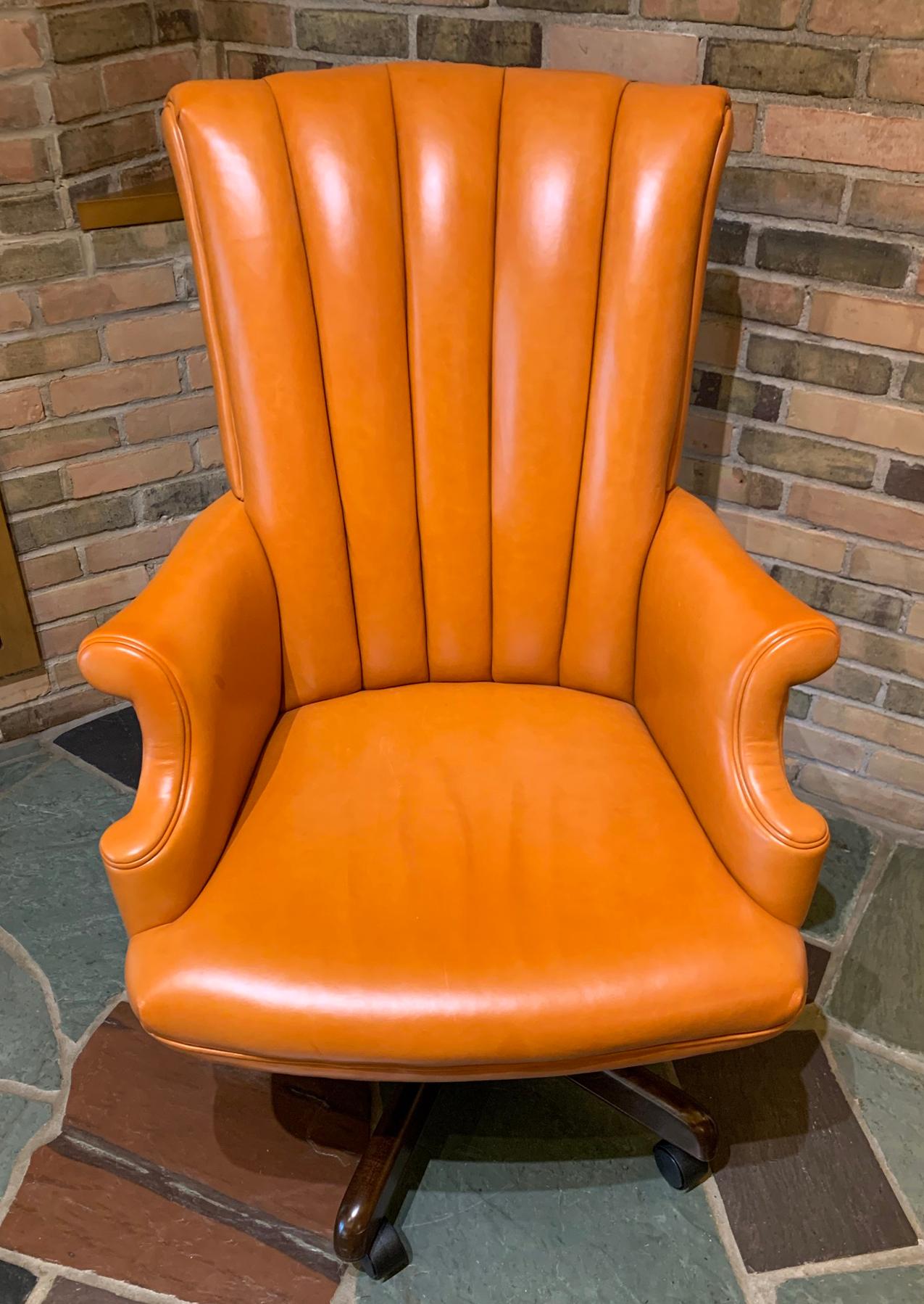 For your consideration is a wonderful, Modernist, high back, rolling office chair, with rolled leather upholstery, by Hancock & Moore. In excellent condition. The dimensions are 24