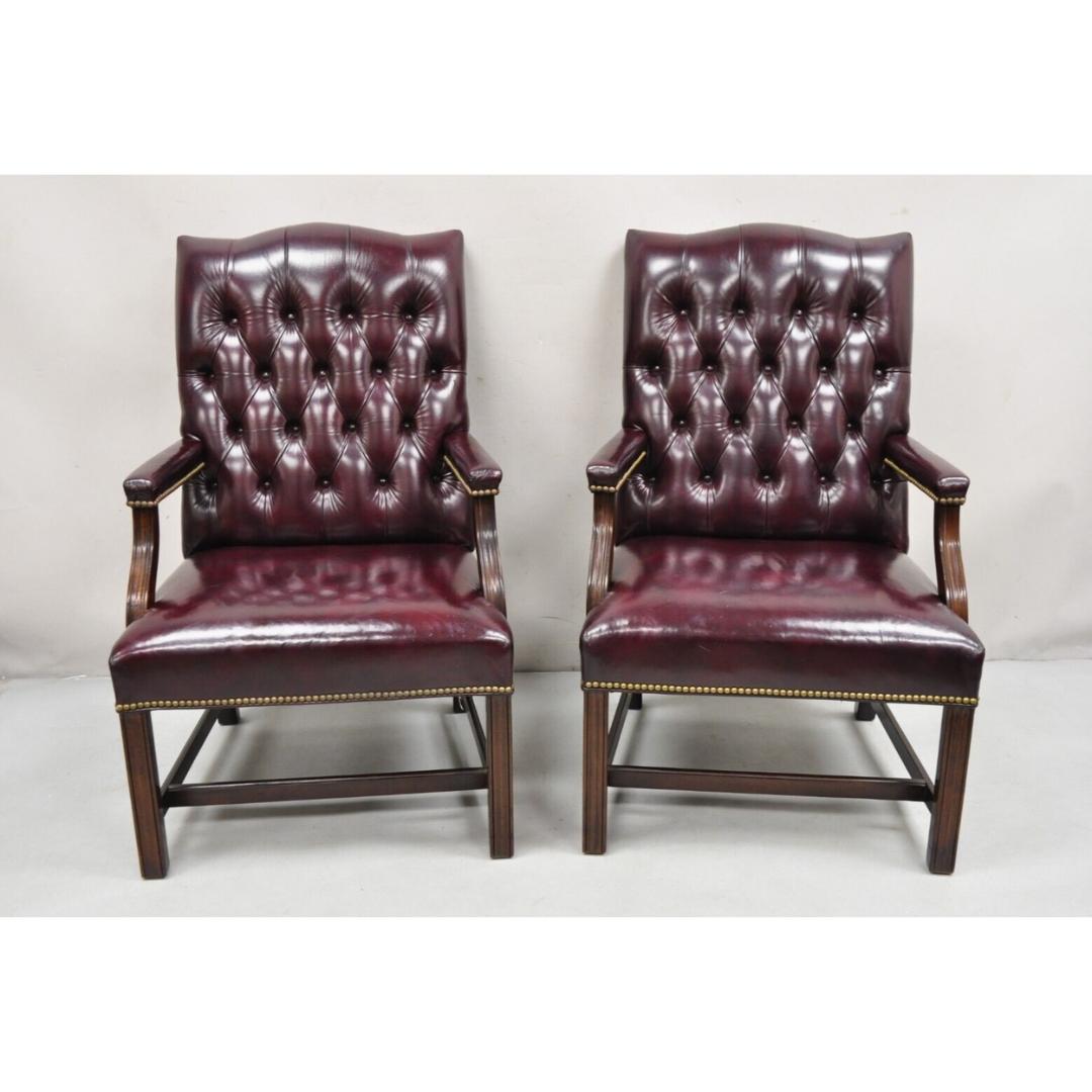 Vintage Hancock & Moore Oxblood Burgundy Leather Chesterfield Button Tufted Office Lounge Chairs - a Pair. Item features brass nailhead trim, solid mahogany wood frame, original label indicating 