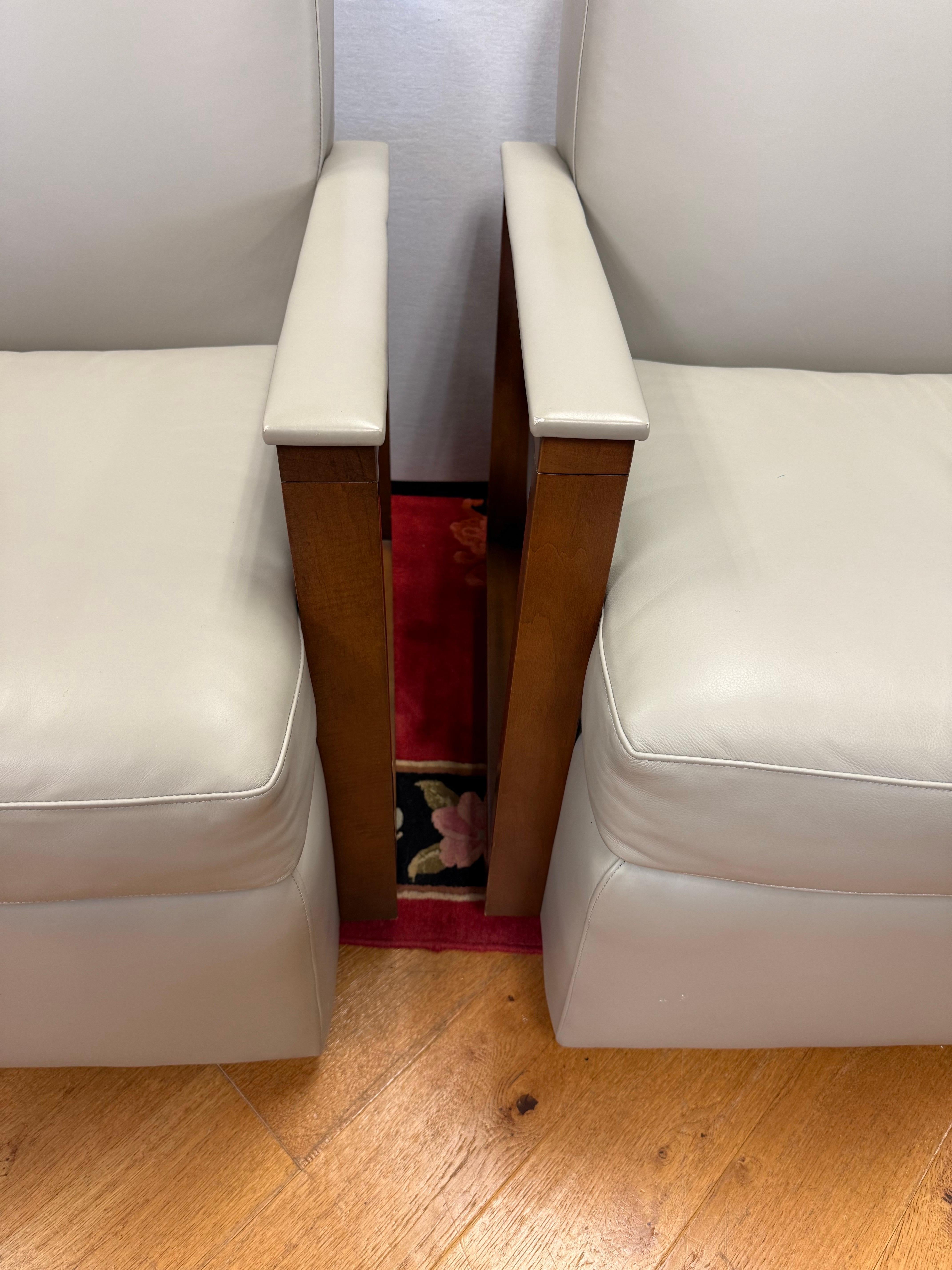 Stunning pair of Hancock & Moore leather swivel chairs from the coveted
Bowery style. Style # is UL6310 and these can retail as high as $6500.00 each. They are in great condition and look like they have not been sat in, ever. Full swivel to go along