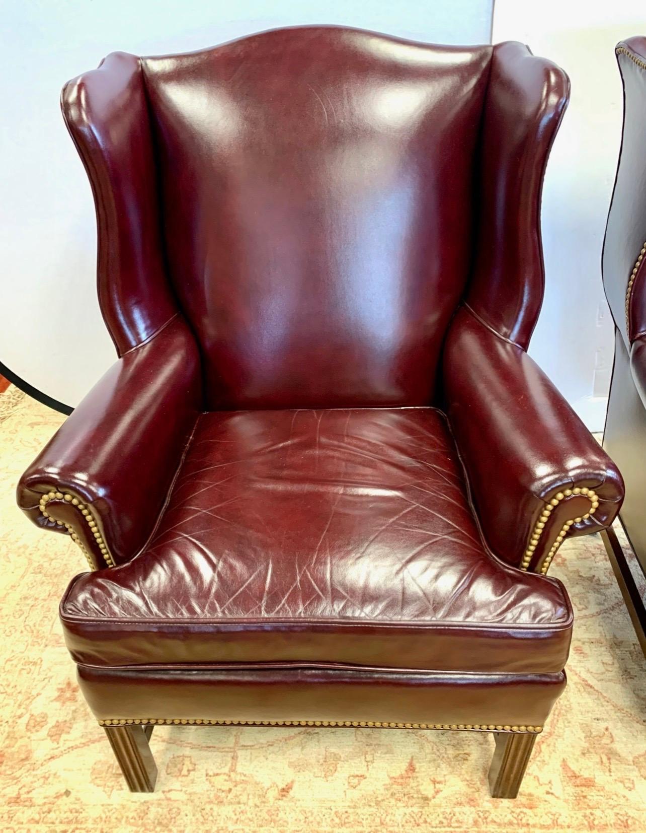 American Hancock & Moore Pair of Matching Merlot Leather and Nailhead Wingback Chairs