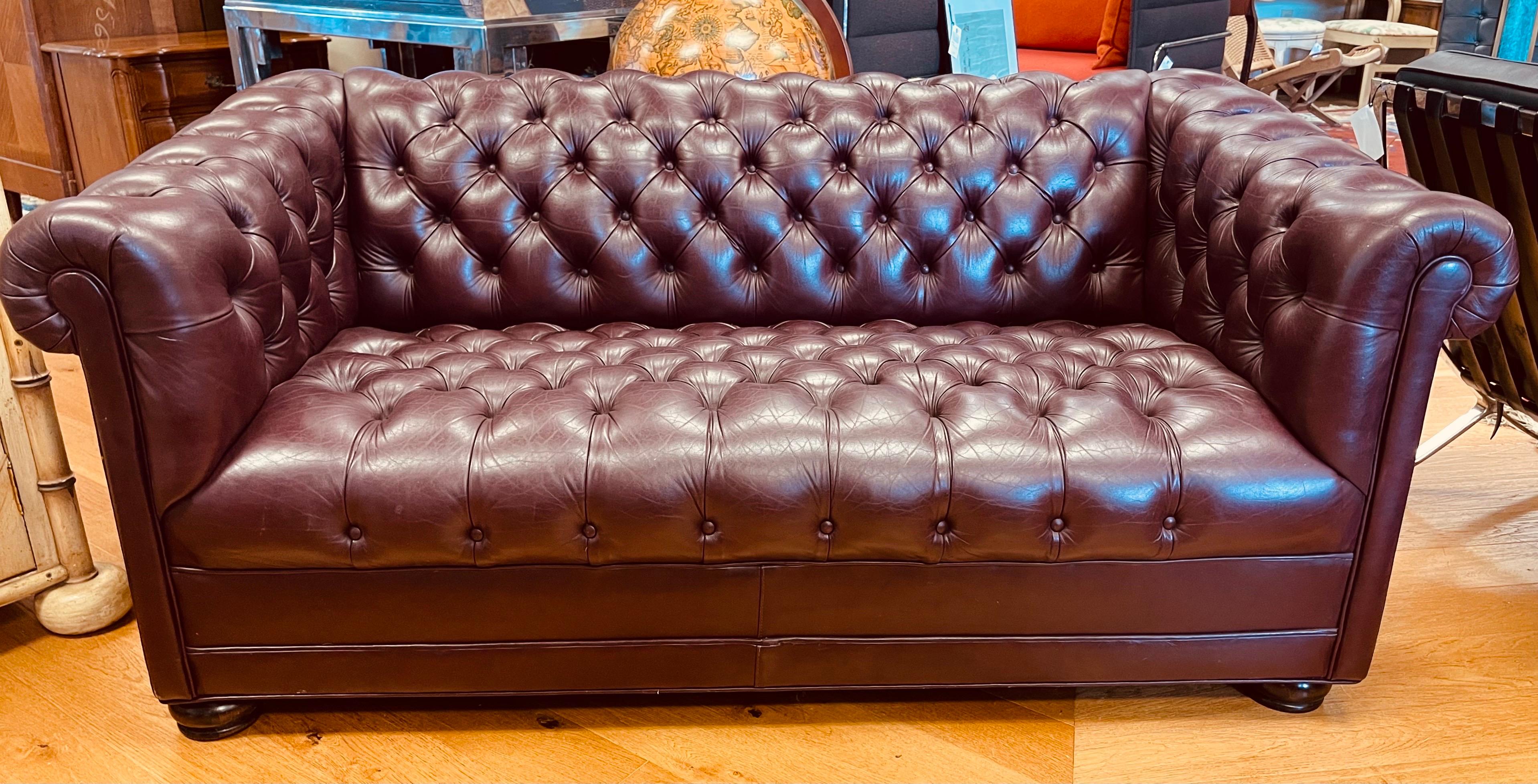 Rare to see an oxblood/burgundy colored signed Hancock & Moore sofa/loveseat in this scale - measuring 68