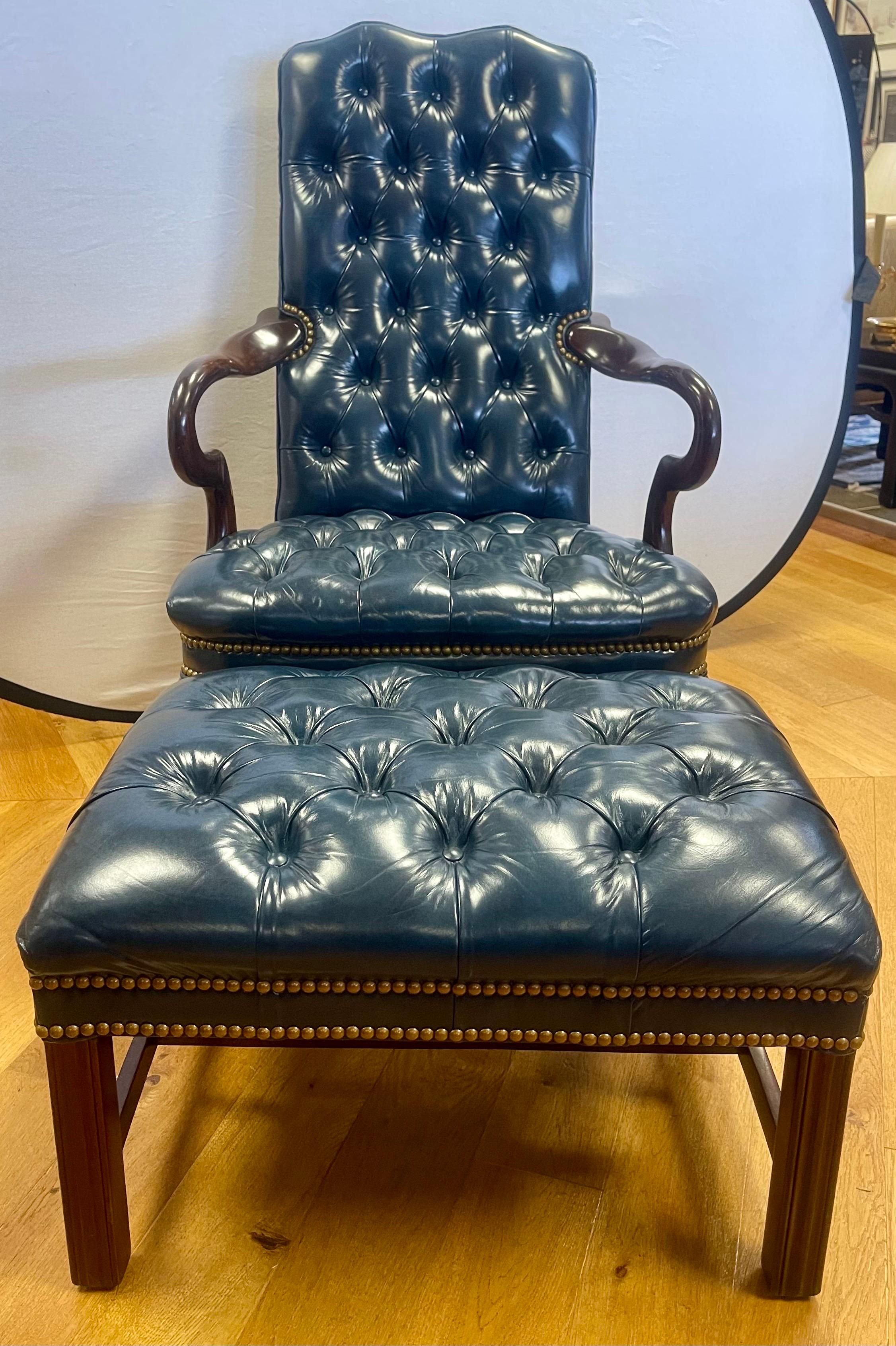 Signed Hancock & Moore 2pc set that features sumptuous dark teal blue leather and finished brass nailhead detail.  Also features Queen Anne legs and elegant goose neck arms in rich mahogany.  A classic blend of sophistication and comfort.  The