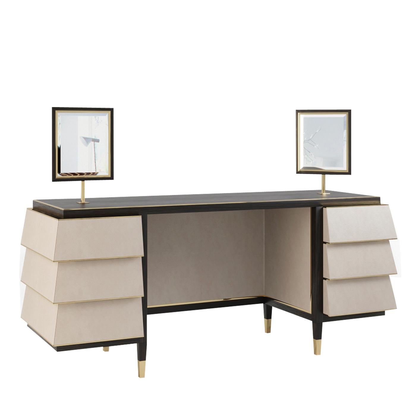 Displaying an exquisitely symmetrical structure, equipped with two built-in rectangular mirrors, this exclusive wooden vanity is supported by four tapered feet with brass-finished metal details. It comprises six drawers with a stunning,