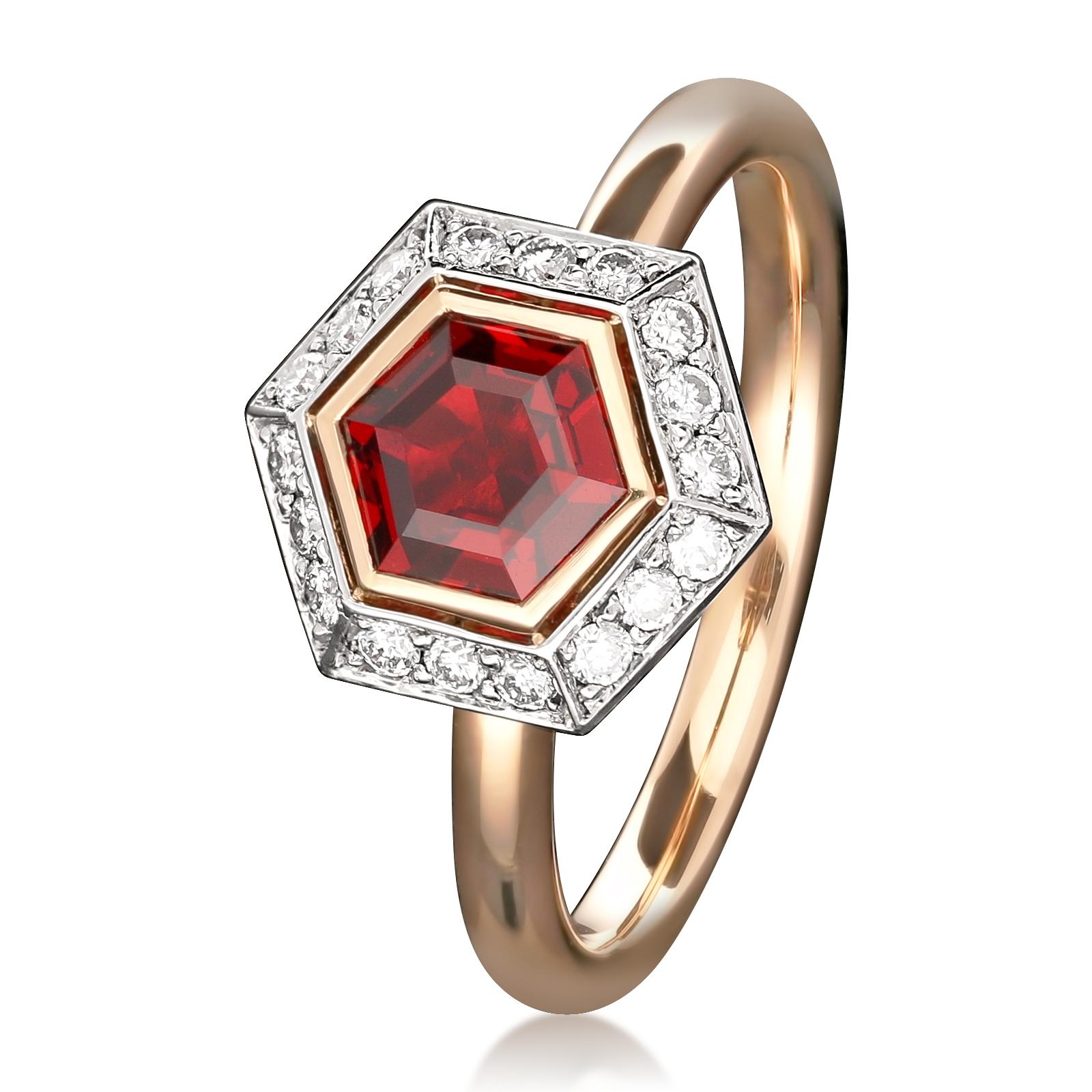 A beautiful red spinel and diamond ring by Hancocks, centred with a wonderfully rich vivid red hexagonal step-cut Burmese spinel weighing 0.92ct and certified unheated, in a geometric rub over rose gold setting surrounded by a separated frame of