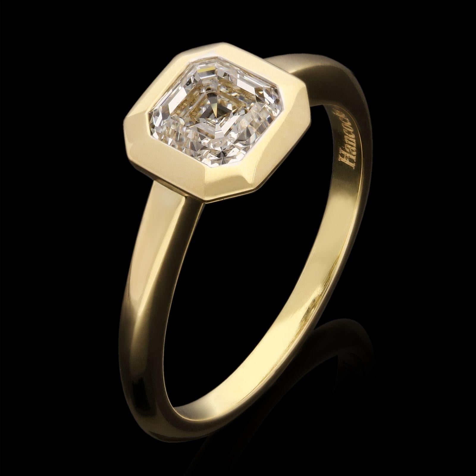 A beautiful old-cut diamond and yellow gold ring by Hancocks, centred with a beautiful vintage Asscher cut diamond weighing 1.01ct and of G colour and SI1 clarity bezel set within a finely hand crafted 18ct yellow gold mount with geometric barred