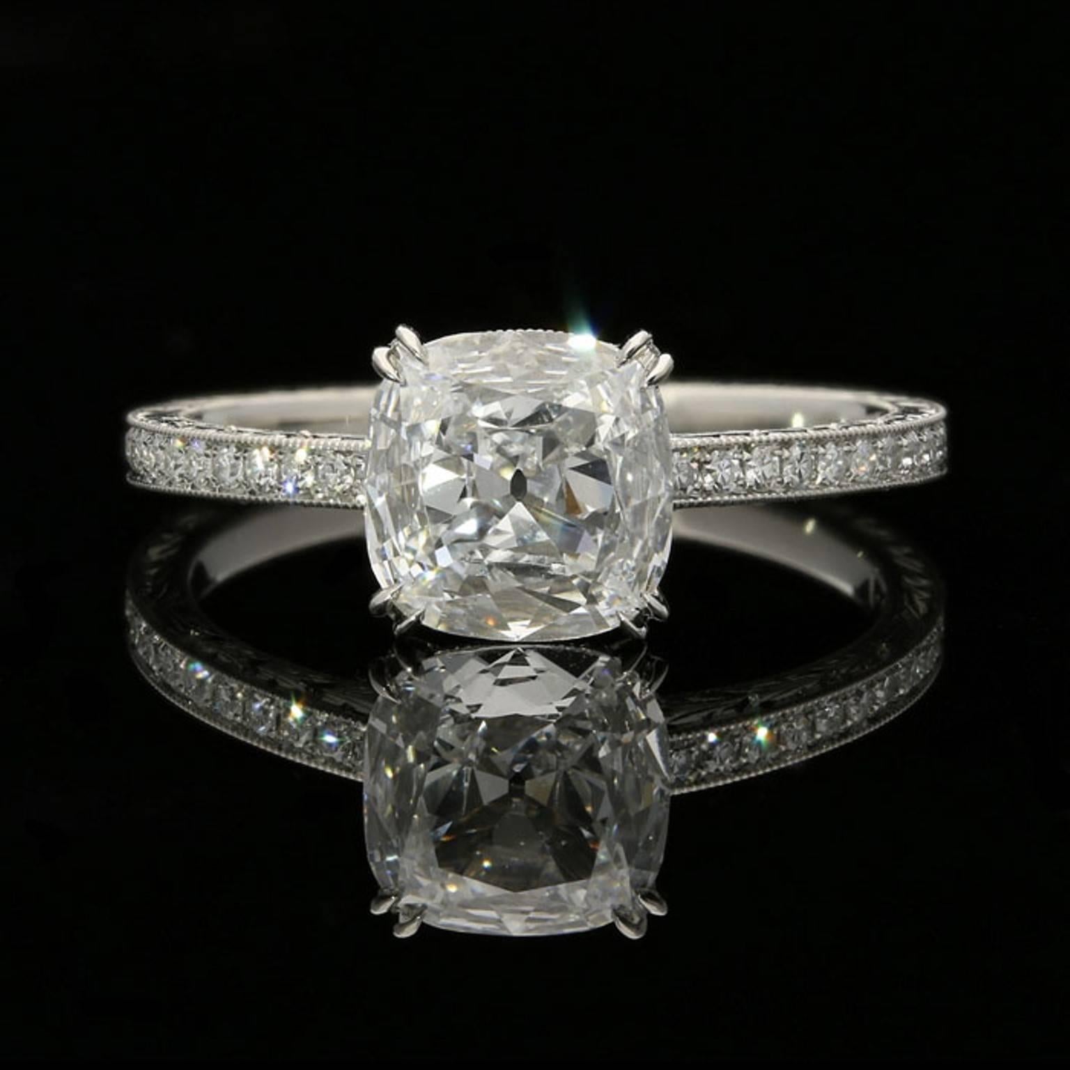 
1.02ct  old mine cut cushion diamond with GIA certificate 
0.30cts total of D VS single cut diamonds.
UK finger size K, US size 5.5, can be adjusted to your own finger size
3.18 grams

A beautiful diamond solitaire ring by Hancocks set to the
