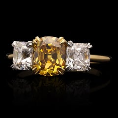 Hancocks 1.42ct Fancy Deep Orangey-Yellow Diamond Ring with Diamond Shoulders