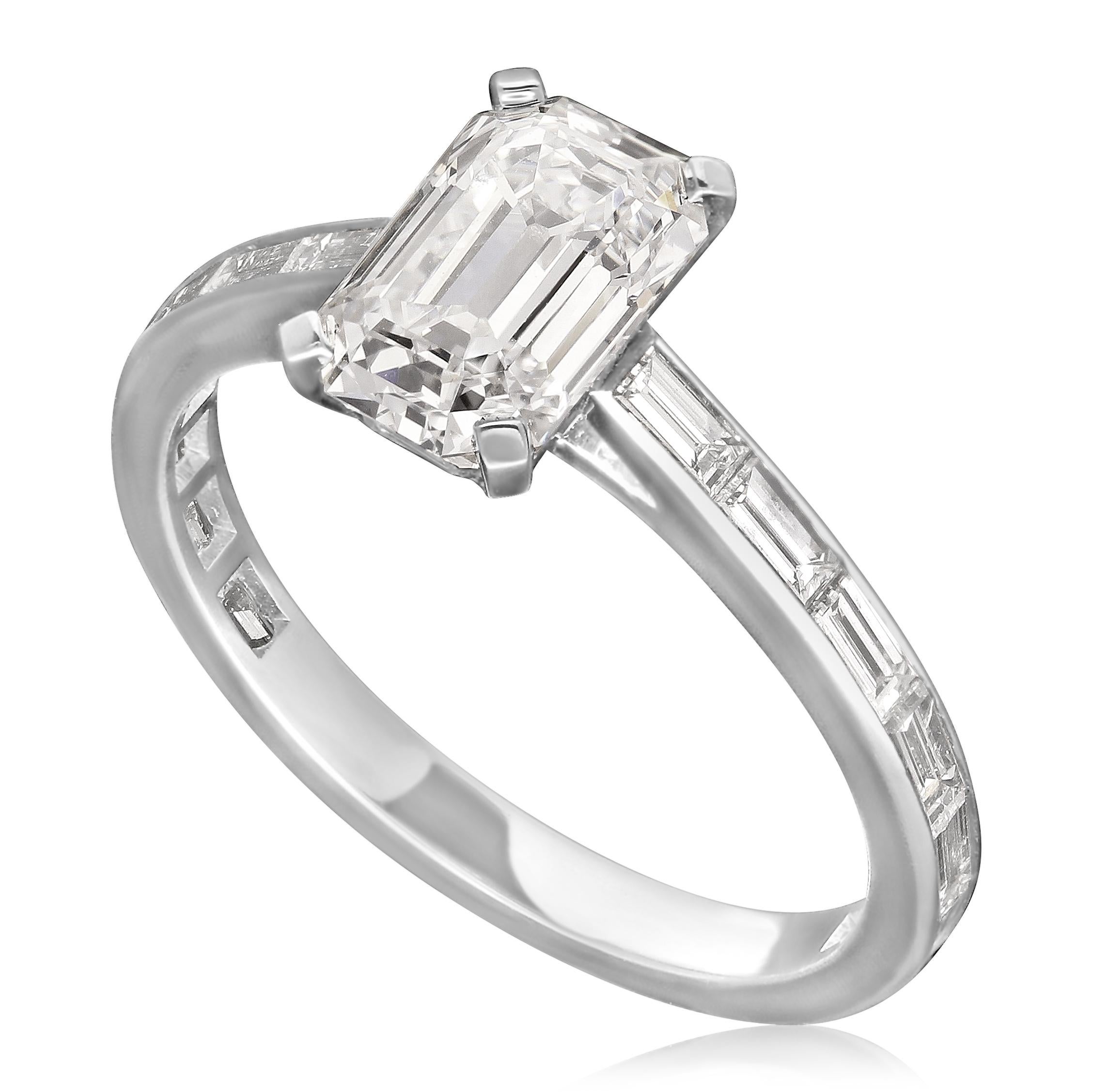 A classic emerald-cut diamond solitaire ring by Hancocks, set with a beautiful vintage emerald-cut diamond weighing 1.52cts and of D colour and IF clarity, corner claw set within a simple platinum mount, the band channel set with baguette