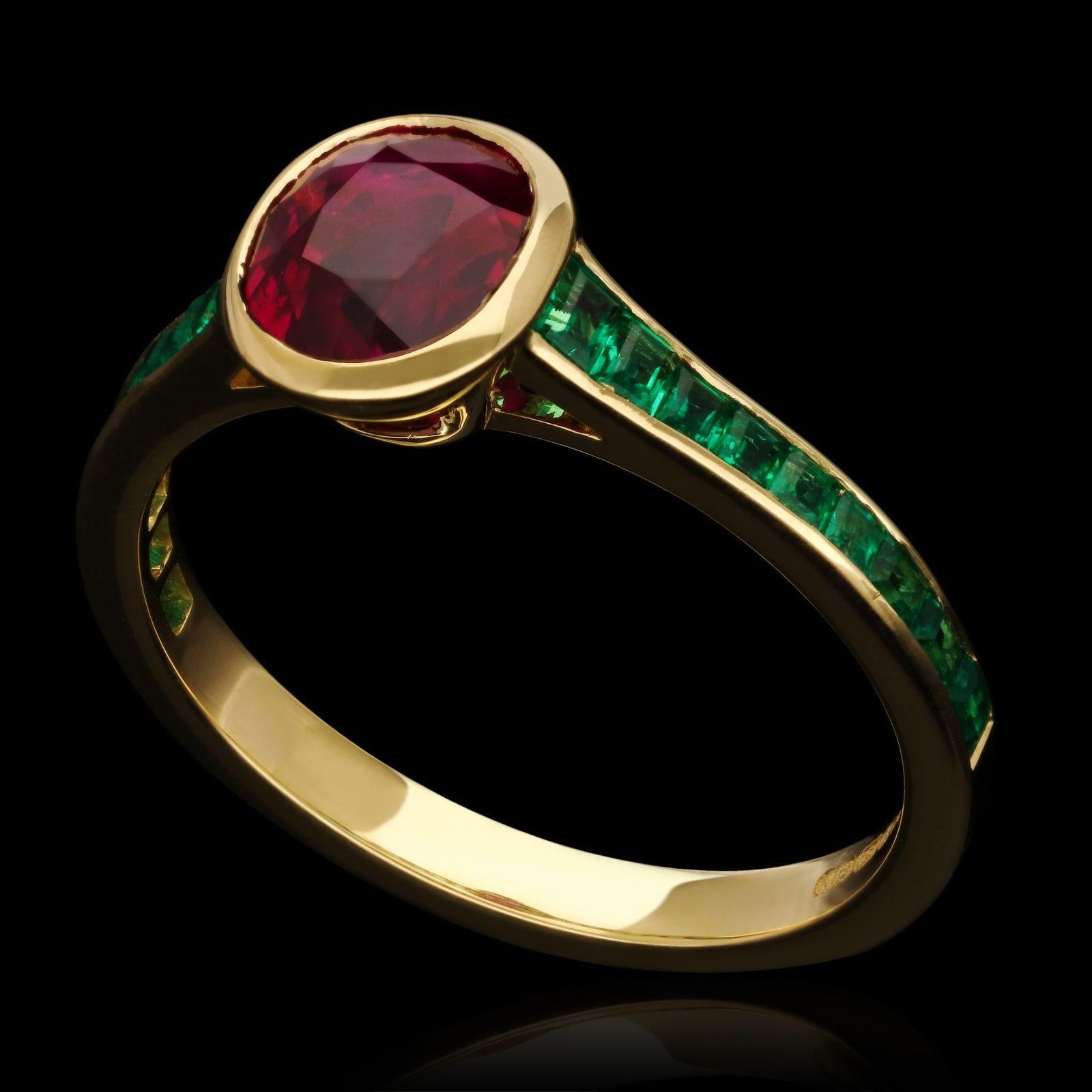 A beautiful ruby and emerald ring by Hancocks, centred with a vibrant cushion cut unheated Burmese ruby weighing 1.58cts in a rub over setting between elegantly tapering shoulders channel set with calibre cut emeralds, all in a finely hand crafted