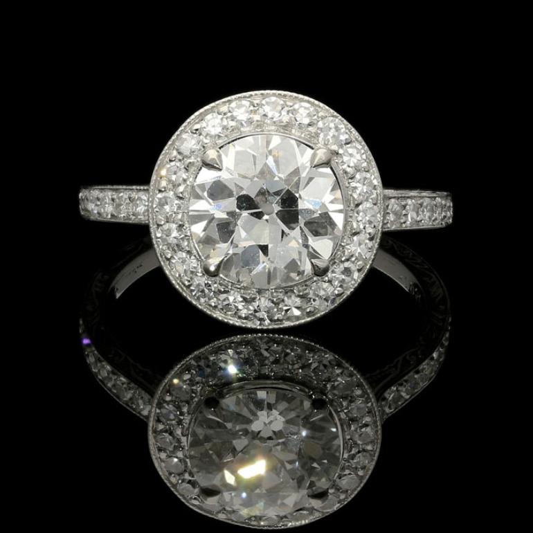 1.70ct I VVS2 old European brilliant cut diamond with GIA certificate
0.40cts total weight of single cut diamonds
Platinum signed Hancocks
UK finger size L, can be adjusted to your own finger size

A beautiful old cut diamond ring by Hancocks,