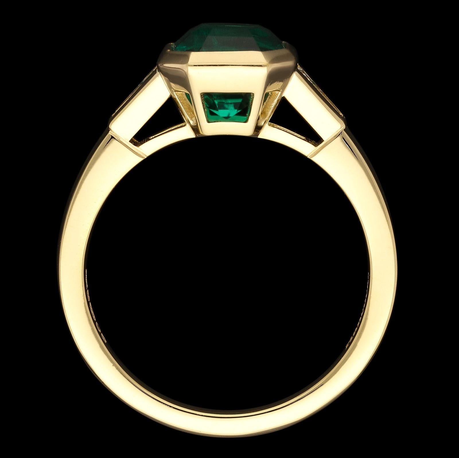 Women's or Men's Hancocks 1.83ct Colombian Emerald Ring in 18ct Gold Baguette Diamond Shoulders For Sale