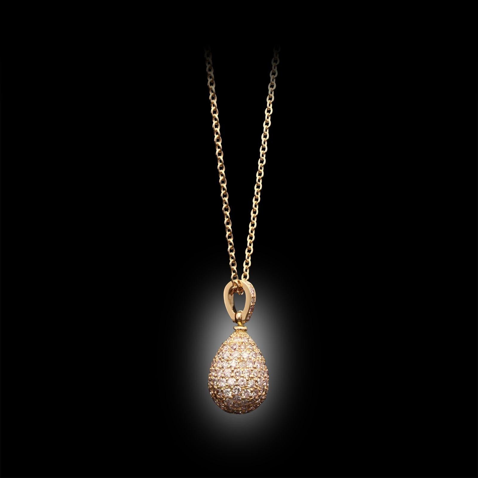 A beautiful pink diamond and rose gold pendant by Hancocks, the egg shaped pendant formed in 18ct rose gold and pavé set throughout with single cut pink diamonds weighing a combined total of 1.25cts suspended from a diamond set bale and hung from an