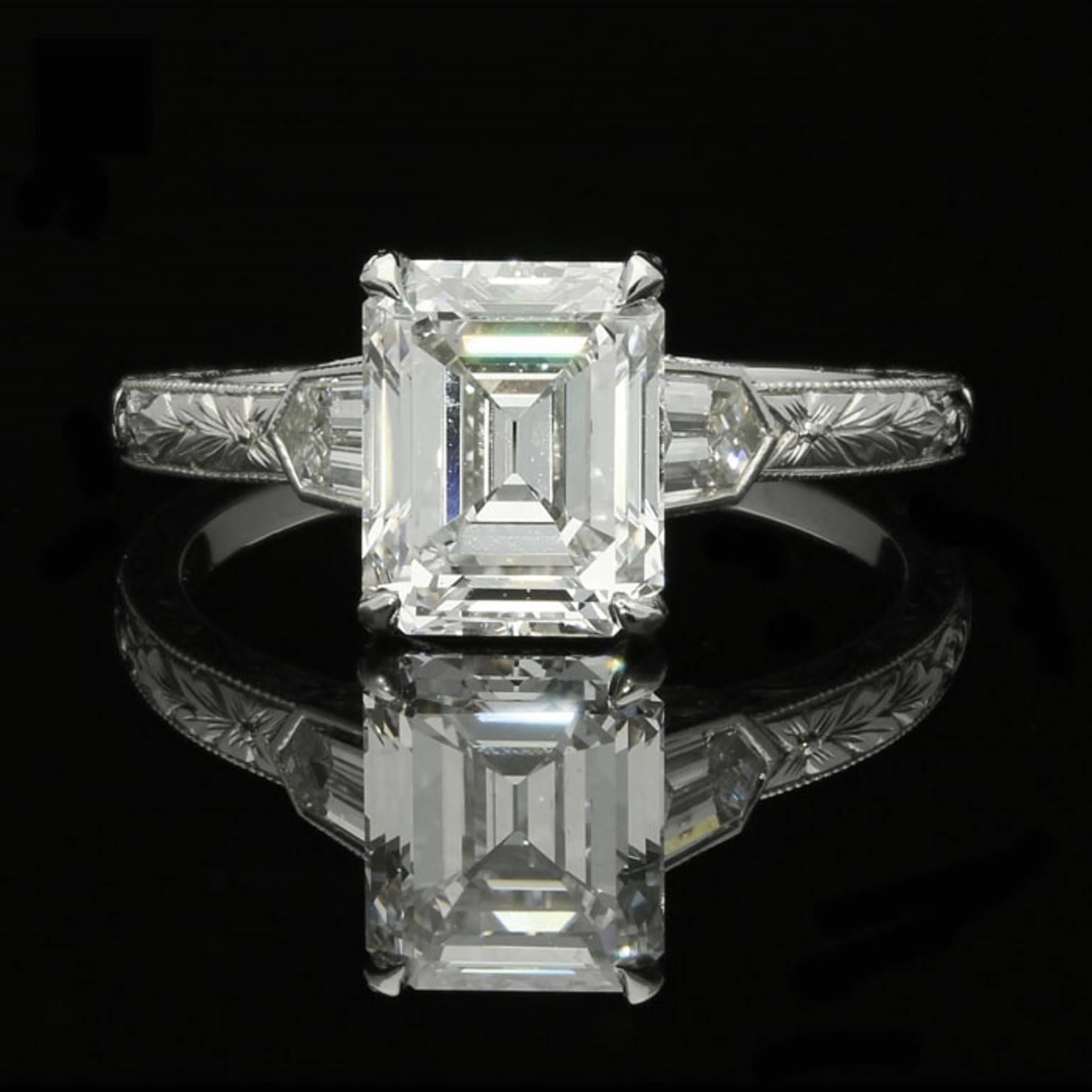 2.02ct D VS2 emerald cut diamond with GIA certificate 
Pair of bullet cut diamonds with a combined weight of 0.20cts.
Pair of bullet cut diamonds with a combined weight of 0.20cts.
UK finger size L, US size 6, can be adjusted to your own finger
