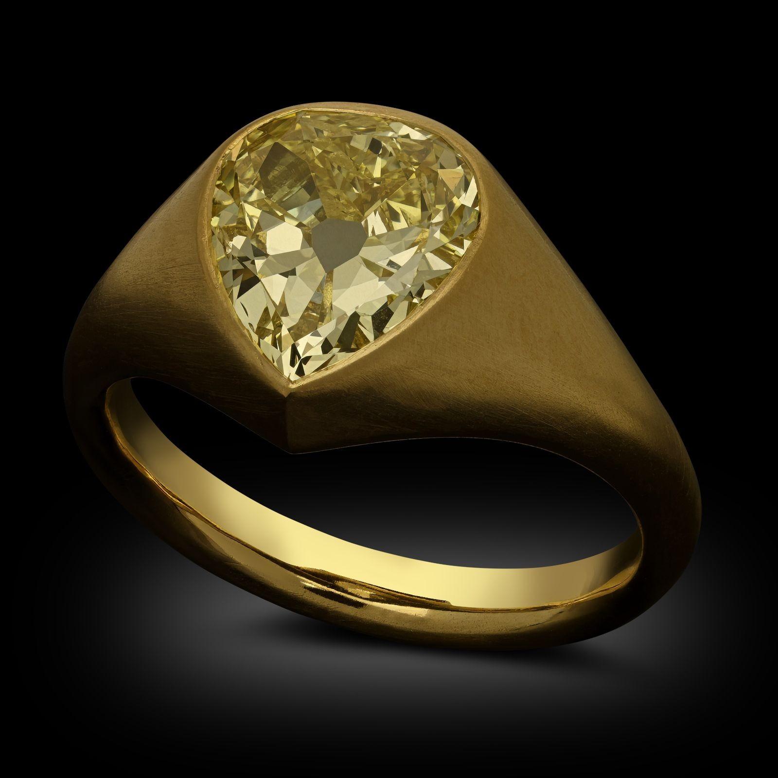 Maker:
Hancocks
Summary:
2.38ct Fancy Intense Yellow Pear Diamond Set Ring in 22ct Gold
Description:
An old cut fancy colour diamond set ring in 22ct yellow gold by Hancocks. The handcrafted ring is set to the centre with a 2.38ct antique pear cut