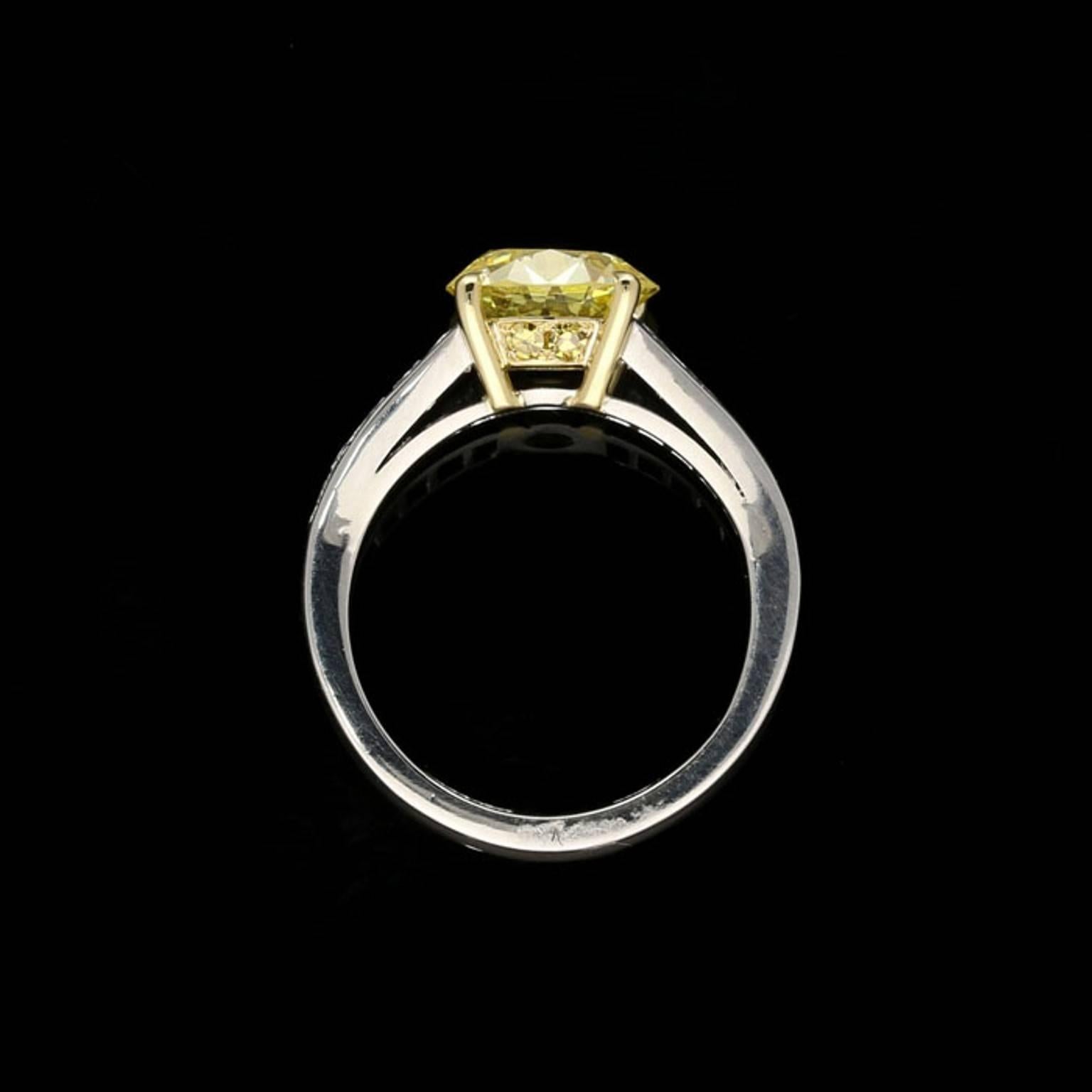 Contemporary Hancocks 2.41 Carat Fancy Intense Yellow Diamond Ring & French-Cut Shoulders