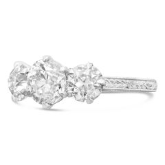 Hancocks 2.62 Carat Diamond Three-Stone Ring in Finely Hand Engraved Platinum