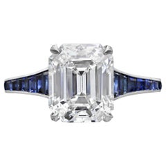Hancocks 3.20 Carat H VVS1 Vintage Emerald Cut Diamond Ring and Sapphire Band 