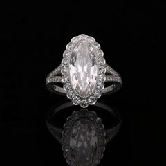 Hancocks 3.35 Carat Moval Diamond Ring with Scalloped Halo and Split Shoulders