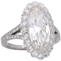 Hancocks 3.35 Carat Moval Diamond Ring with Scalloped Halo and Split Shoulders