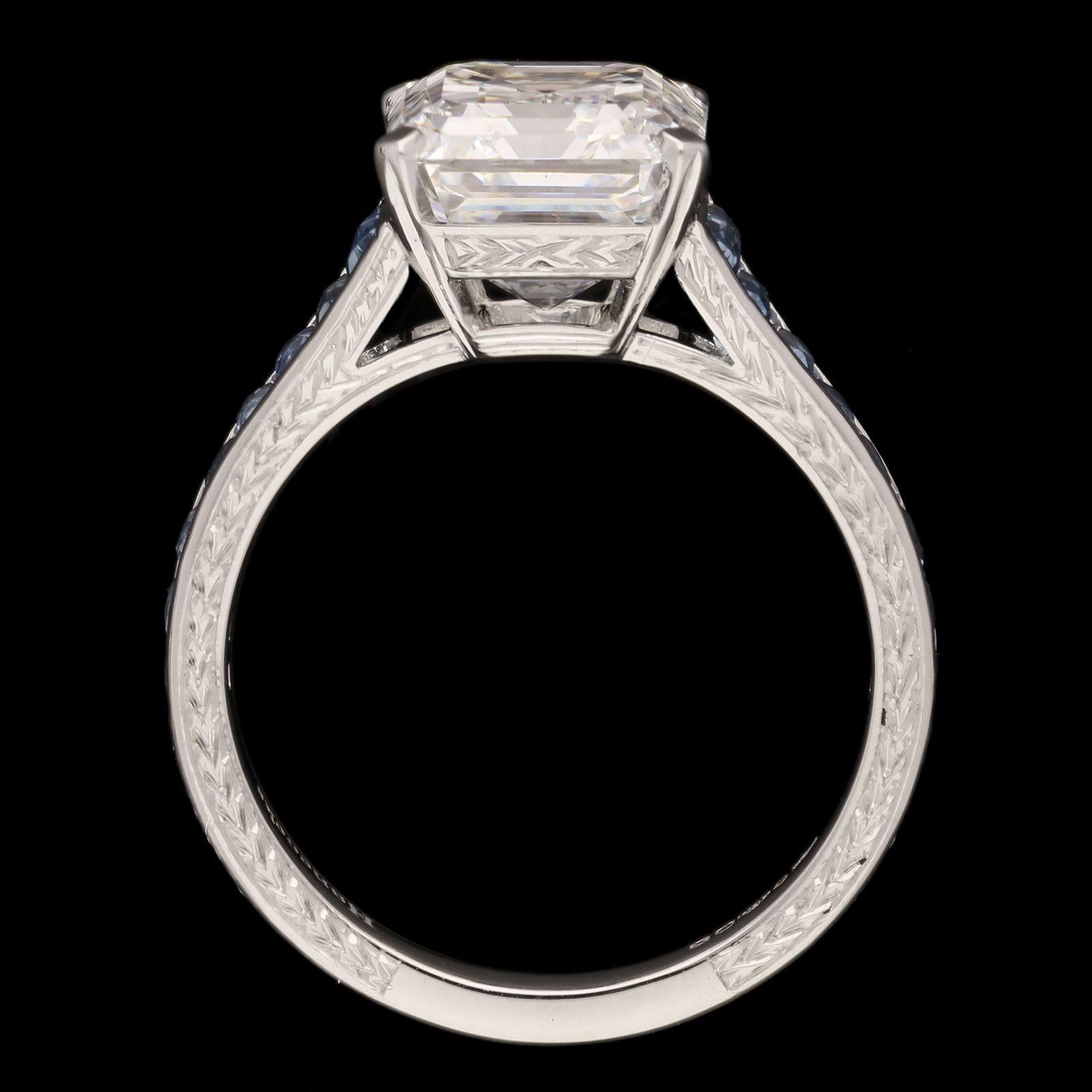 Hancocks 4.48ct Emerald Cut Diamond Ring with Aquamarine Shoulders in Platinum In New Condition For Sale In London, GB