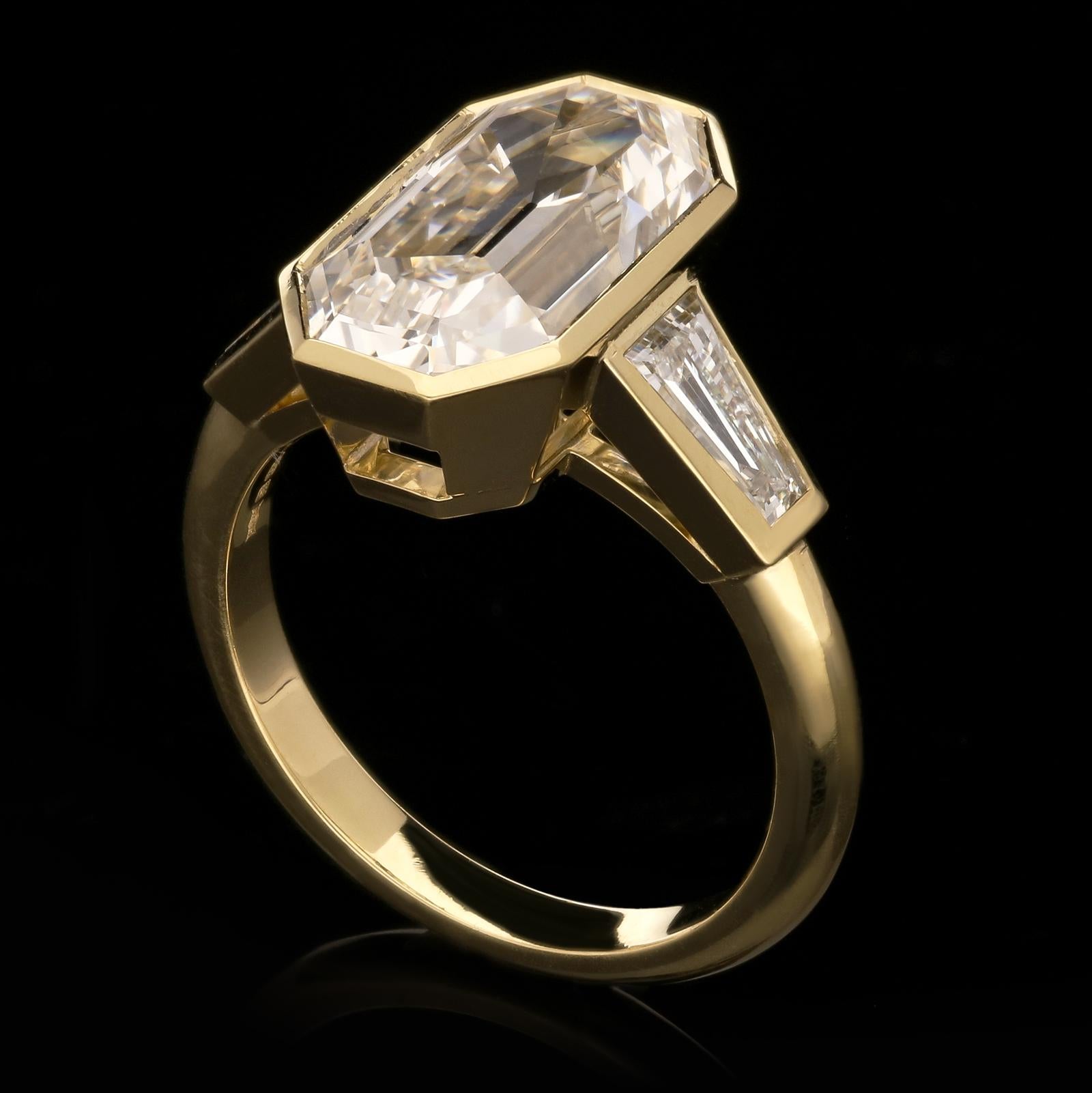 bezel set emerald cut diamond ring