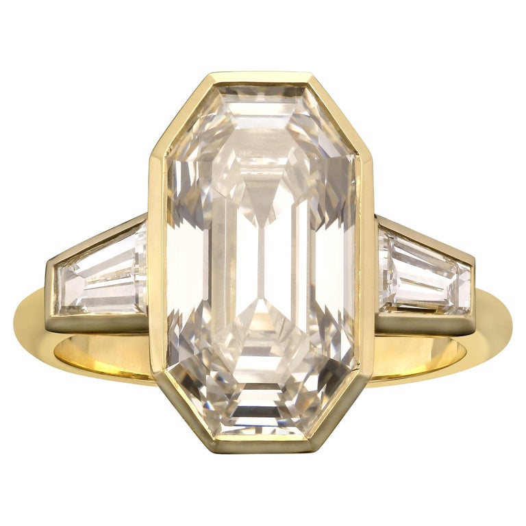 Hancocks 5.38ct Old Emerald Cut Diamond Bezel Set Gold Ring Tapered  Shoulders For Sale at 1stDibs | bezel set emerald cut diamond, bezel set  diamonds, bezel set emerald engagement ring