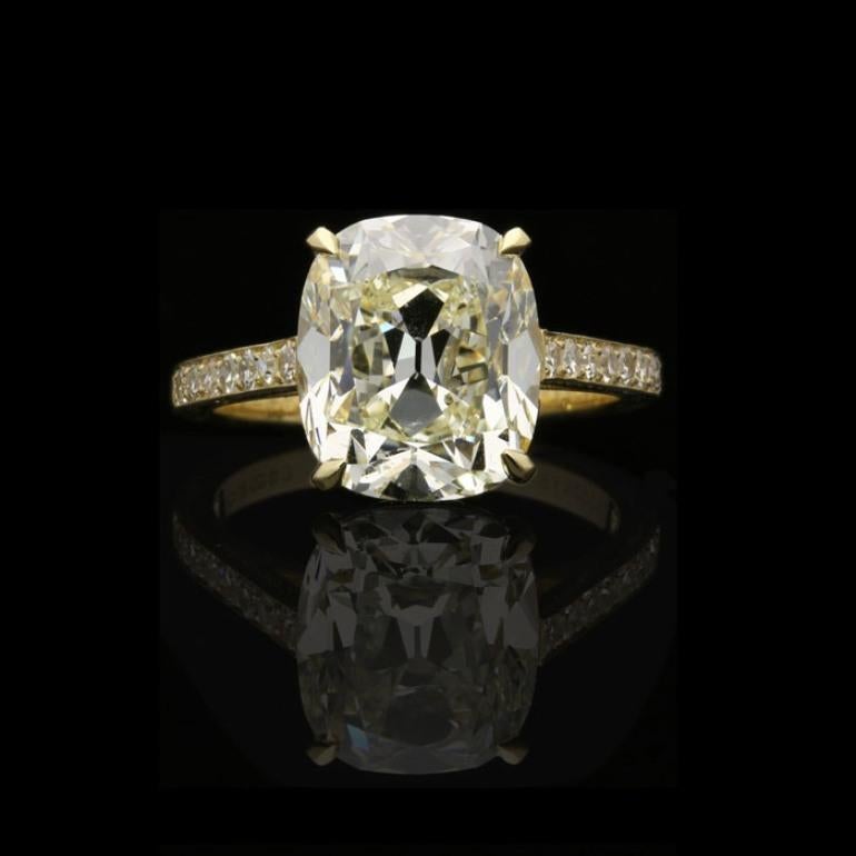 5.72ct M SI1 old European brilliant cut diamond with GIA certificate 
Single cut diamonds weighing a combined total of 0.36cts
18ct yellow gold with maker's mark and London assay marks
UK finger size M, US size 6.5, can be adjusted to your own