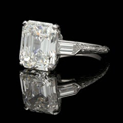 Hancocks 6.24 Carat Emerald Cut Diamond Ring with Bullet Diamond Shoulders