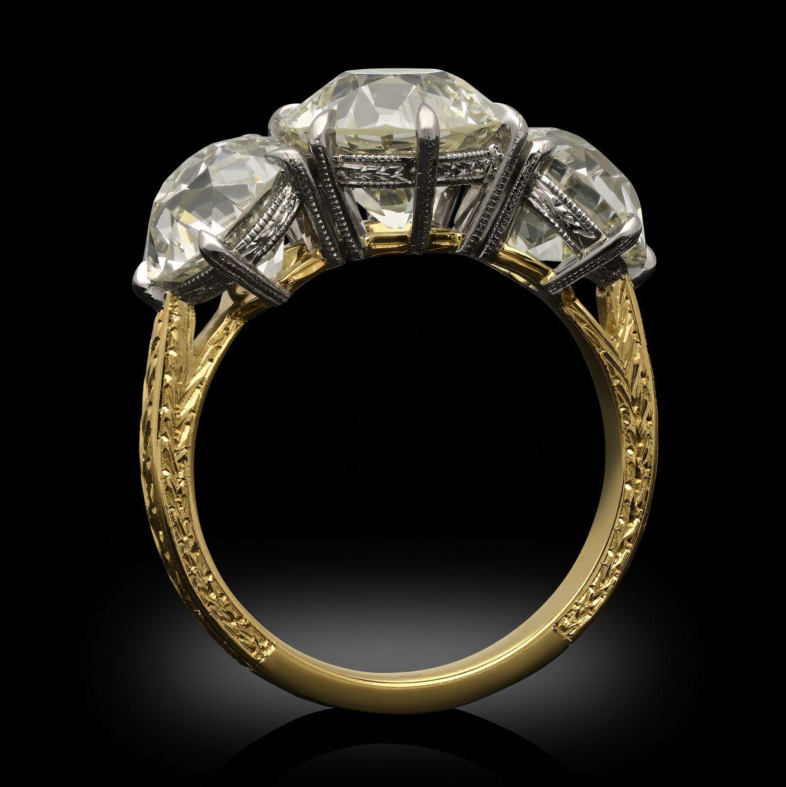Women's or Men's Hancocks 6.77ct Old European Cut Diamond three Stone Ring in 18ct Yellow Gold For Sale