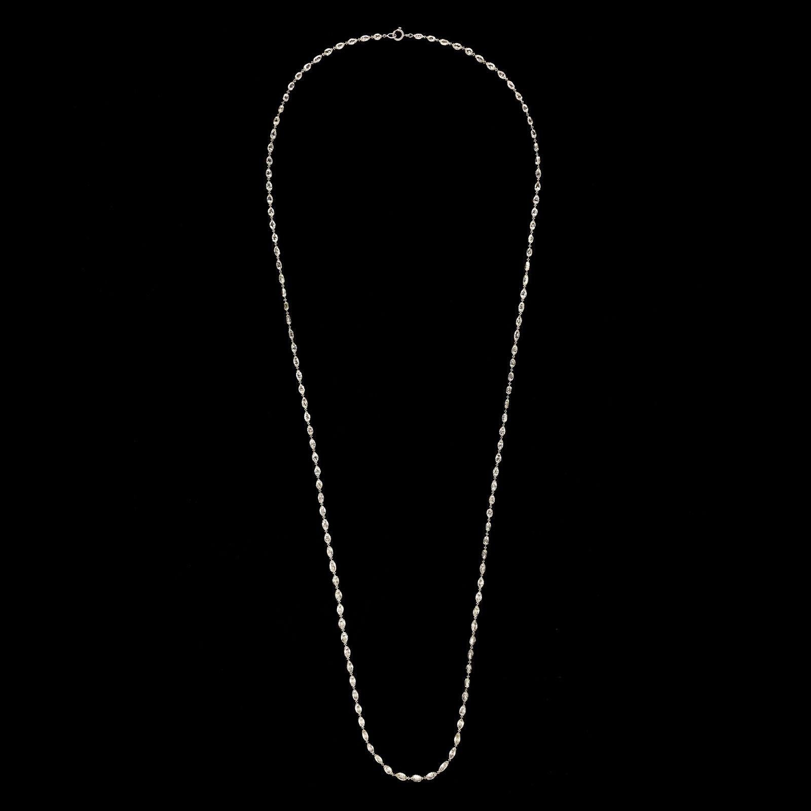 A beautiful diamond and platinum long necklace by Hancocks, the 24
