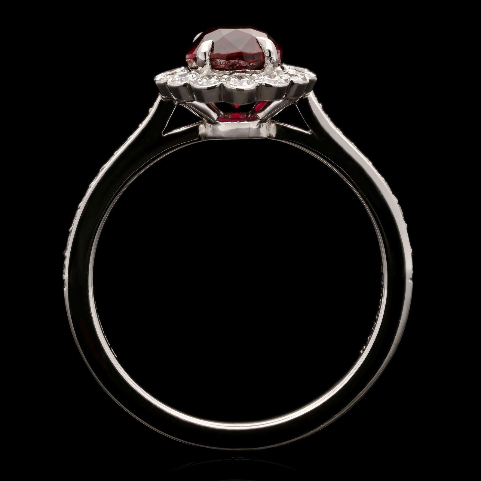 Oval Cut Hancocks Classic 1.57ct Oval Ruby and Round Brilliant Diamond Cluster Ring For Sale