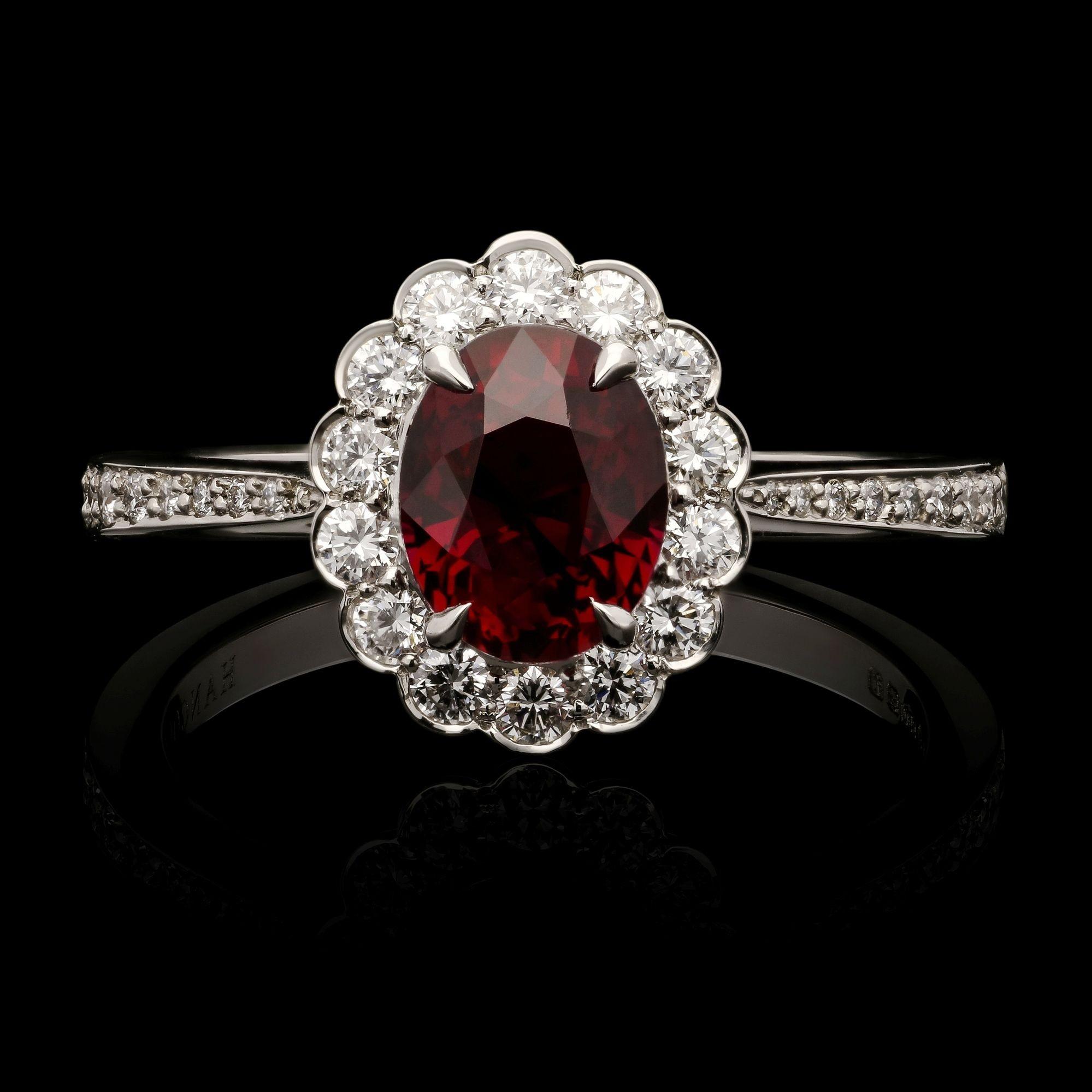 Hancocks Classic 1.57ct Oval Ruby and Round Brilliant Diamond Cluster Ring In New Condition For Sale In London, GB