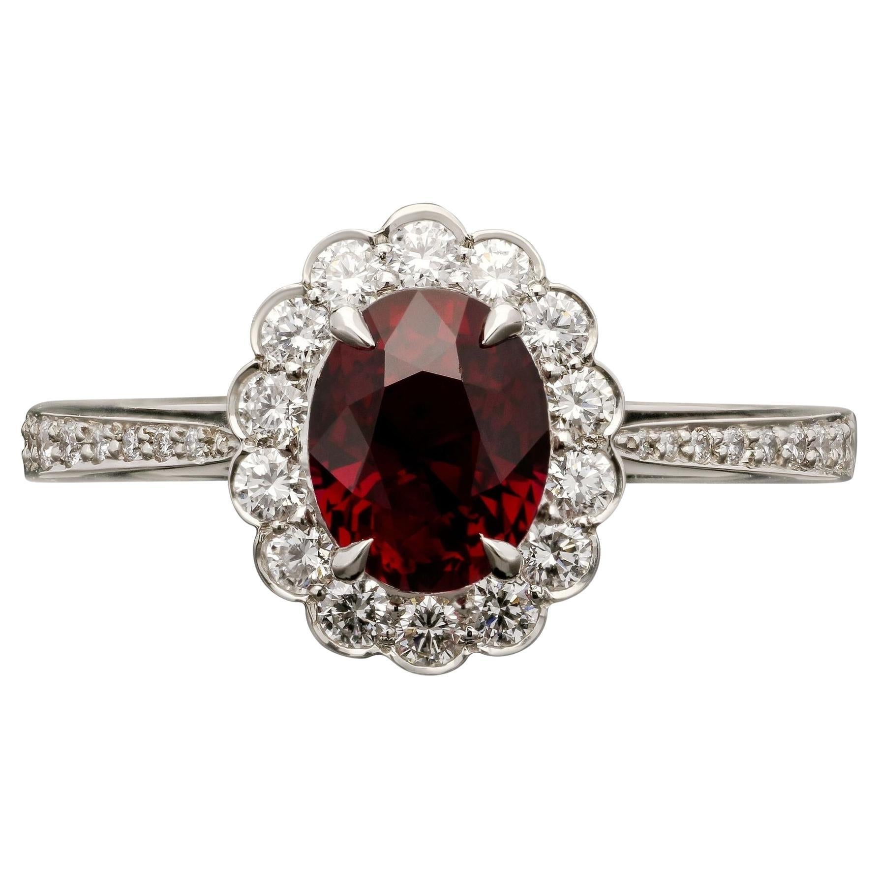 Hancocks Classic 1.57ct Oval Ruby and Round Brilliant Diamond Cluster Ring For Sale