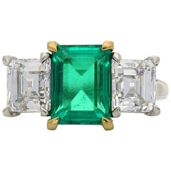 2.68 carat Colombian Emerald and Carre Cut Diamond Three-Stone Ring by Hancocks