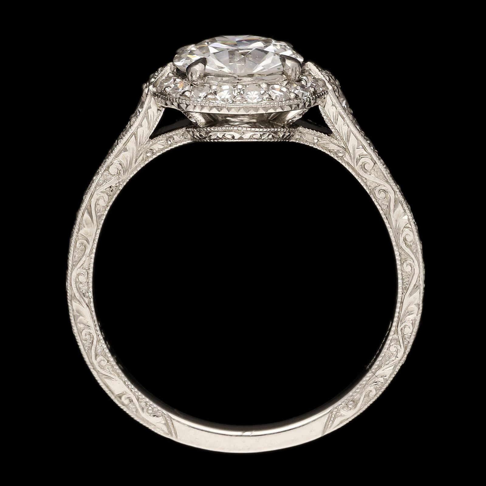 Hancocks Contemporary 1.28ct Brilliant Cut Diamond Ring With Halo Surround In New Condition For Sale In London, GB