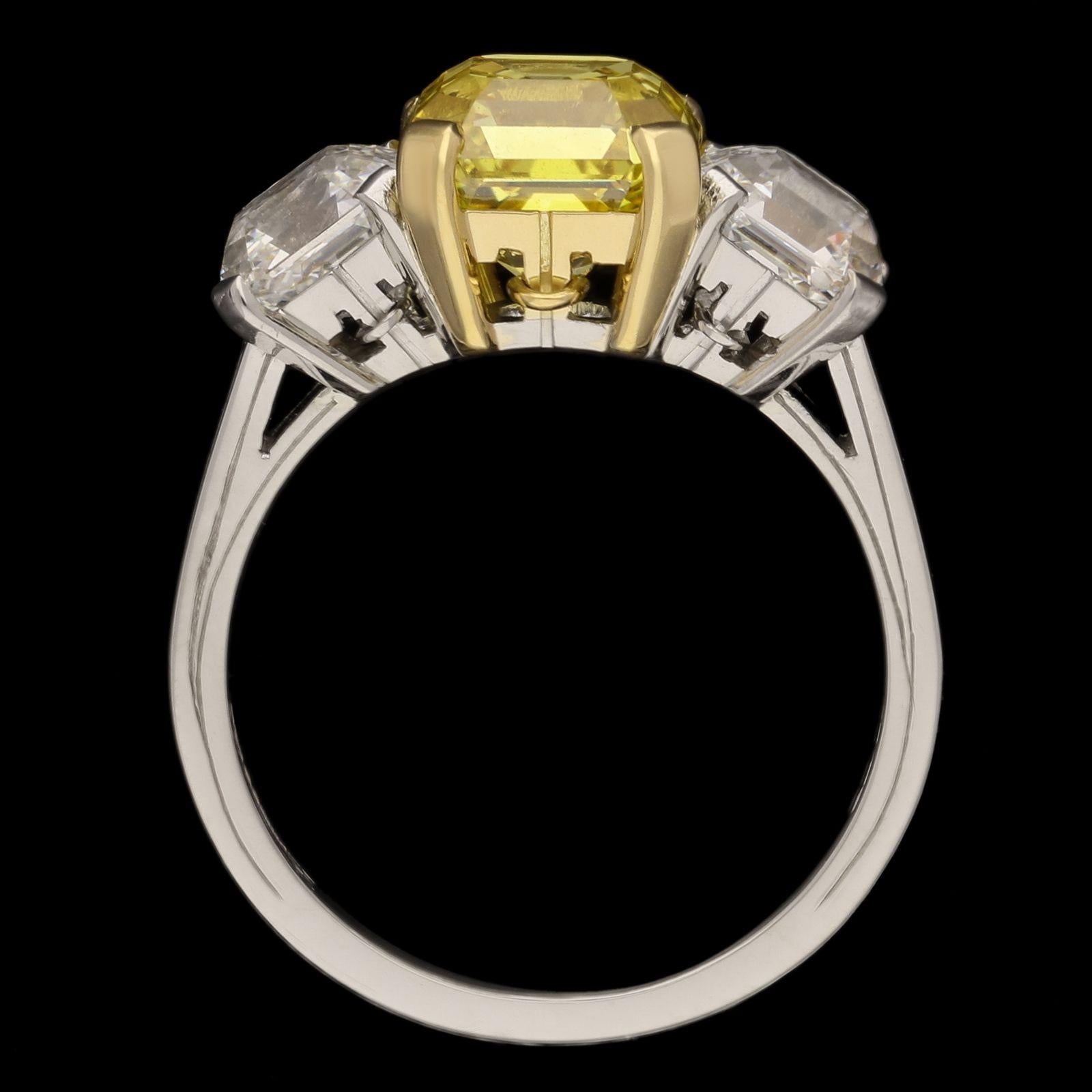 Hancocks Contemporary 2.94ct Fancy Vivid Yellow Asscher Cut Diamond 3 Stone Ring In New Condition For Sale In London, GB