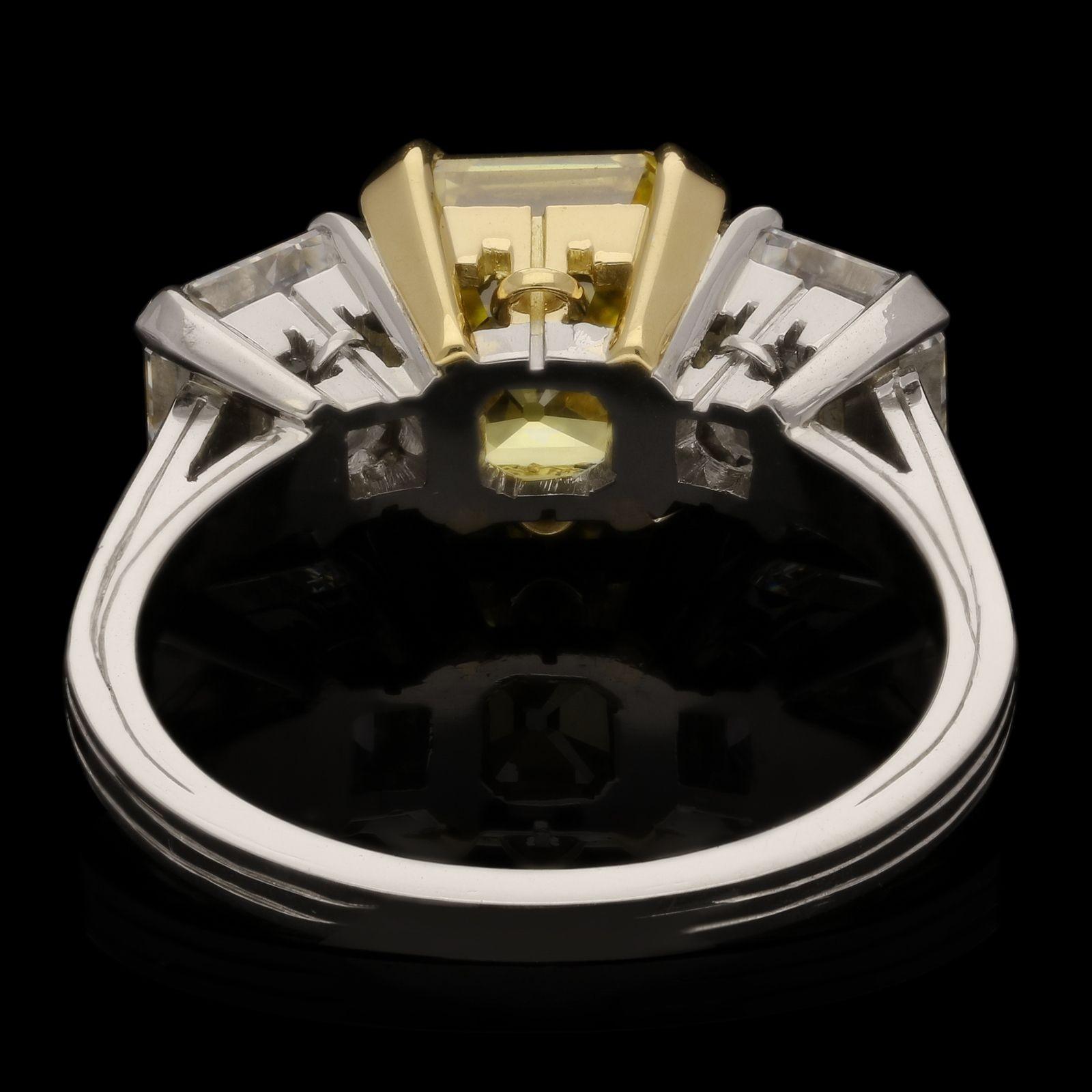 Women's Hancocks Contemporary 2.94ct Fancy Vivid Yellow Asscher Cut Diamond 3 Stone Ring For Sale